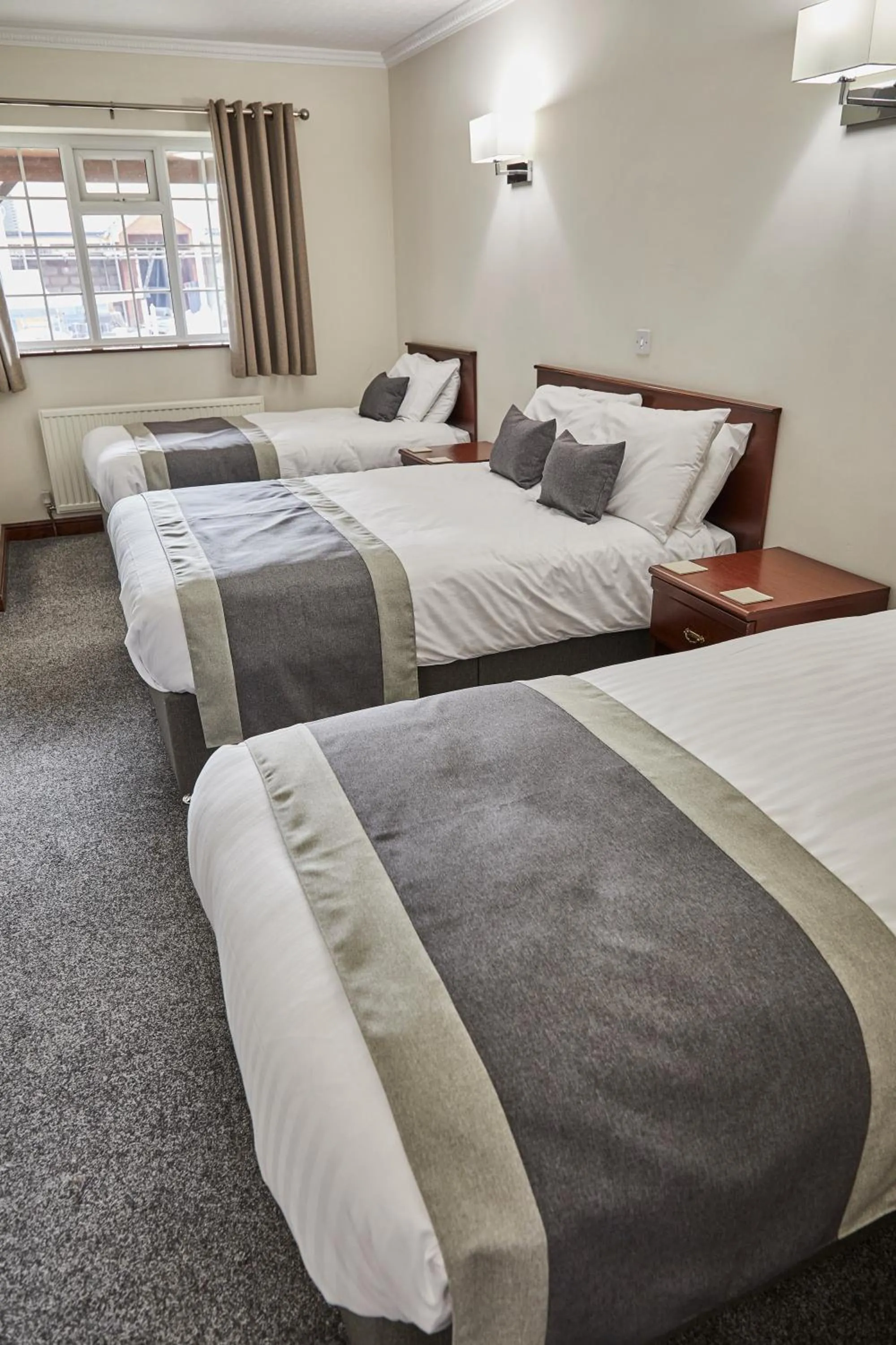 Bed in The Appleby Inn Hotel