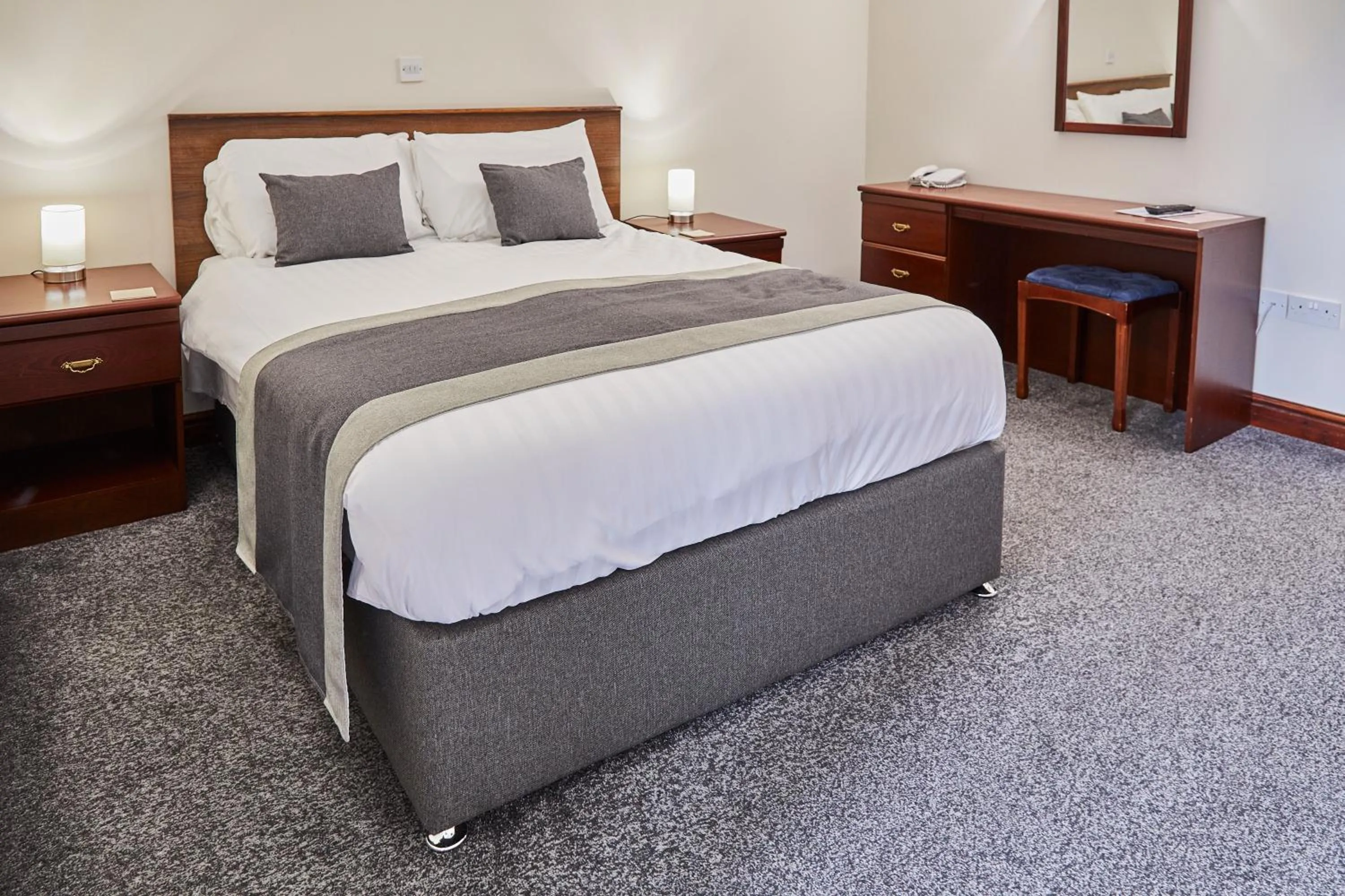 Bed in The Appleby Inn Hotel