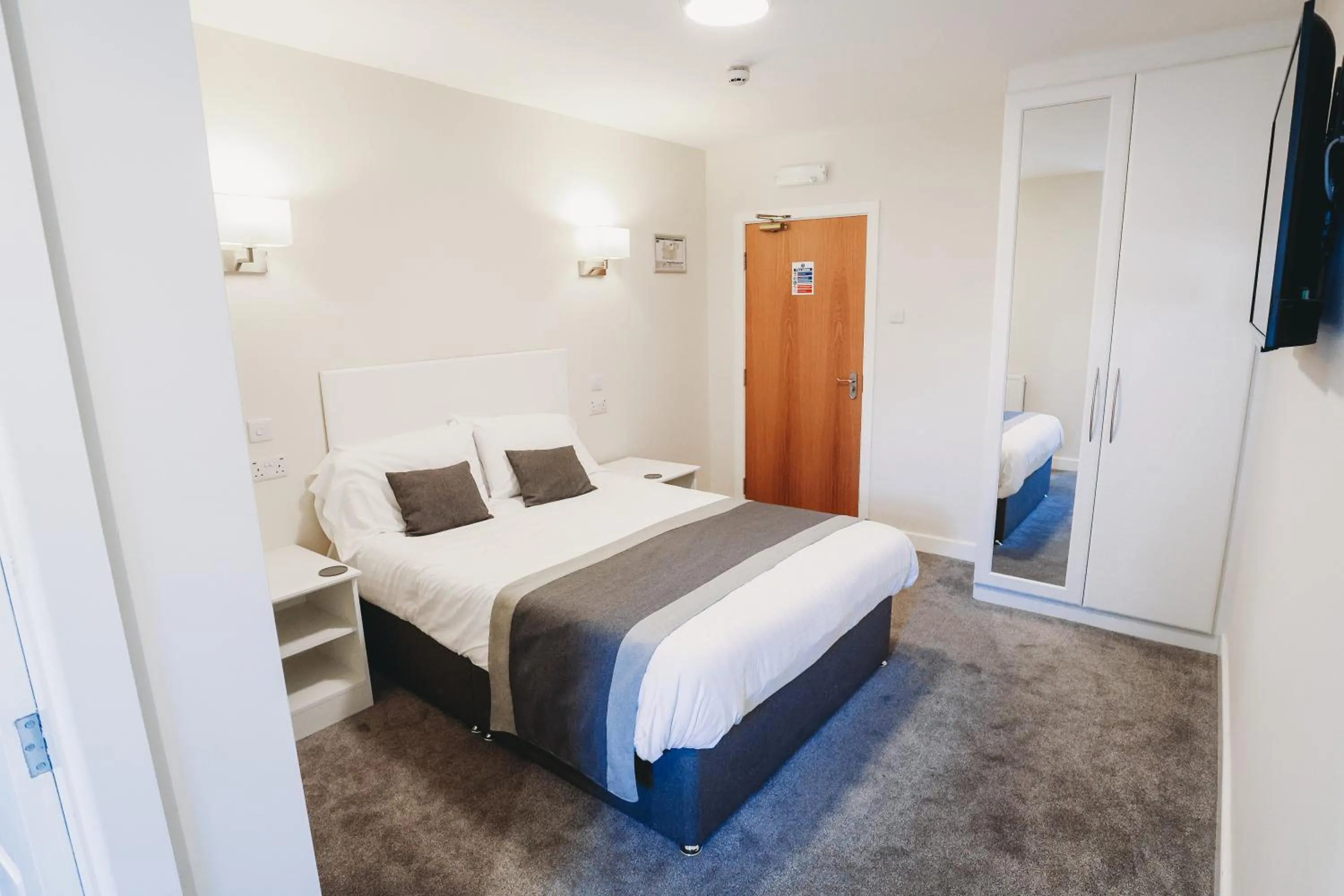 Bed in The Appleby Inn Hotel