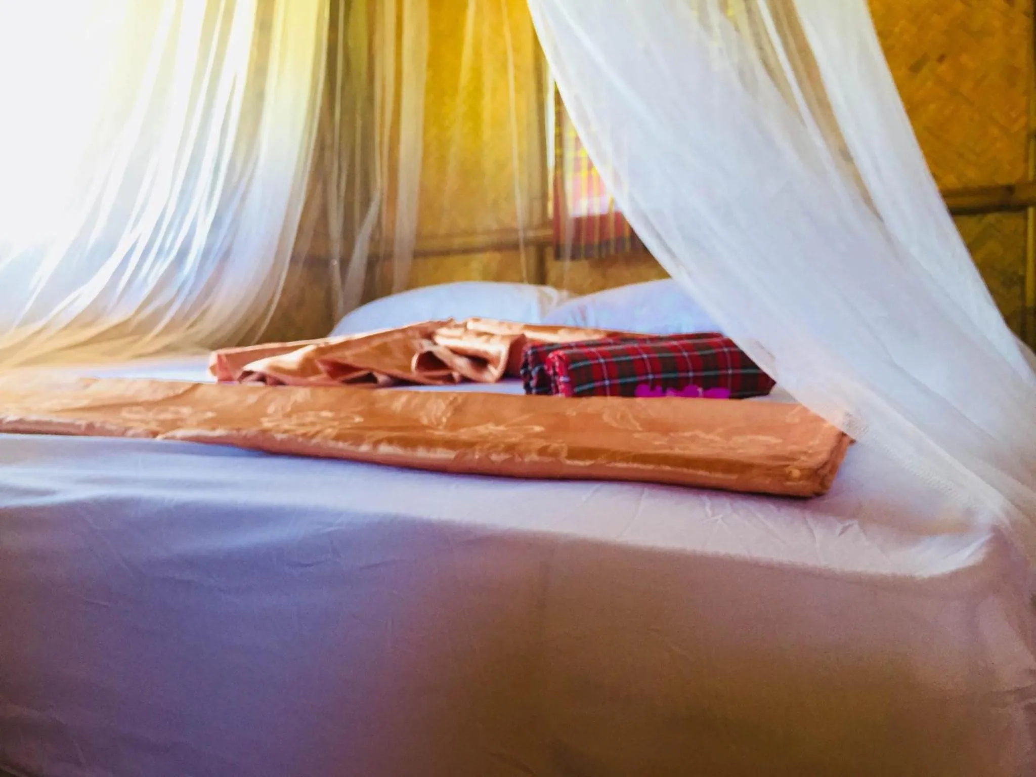 Bed in Koh Phaluai Beach Bangalow