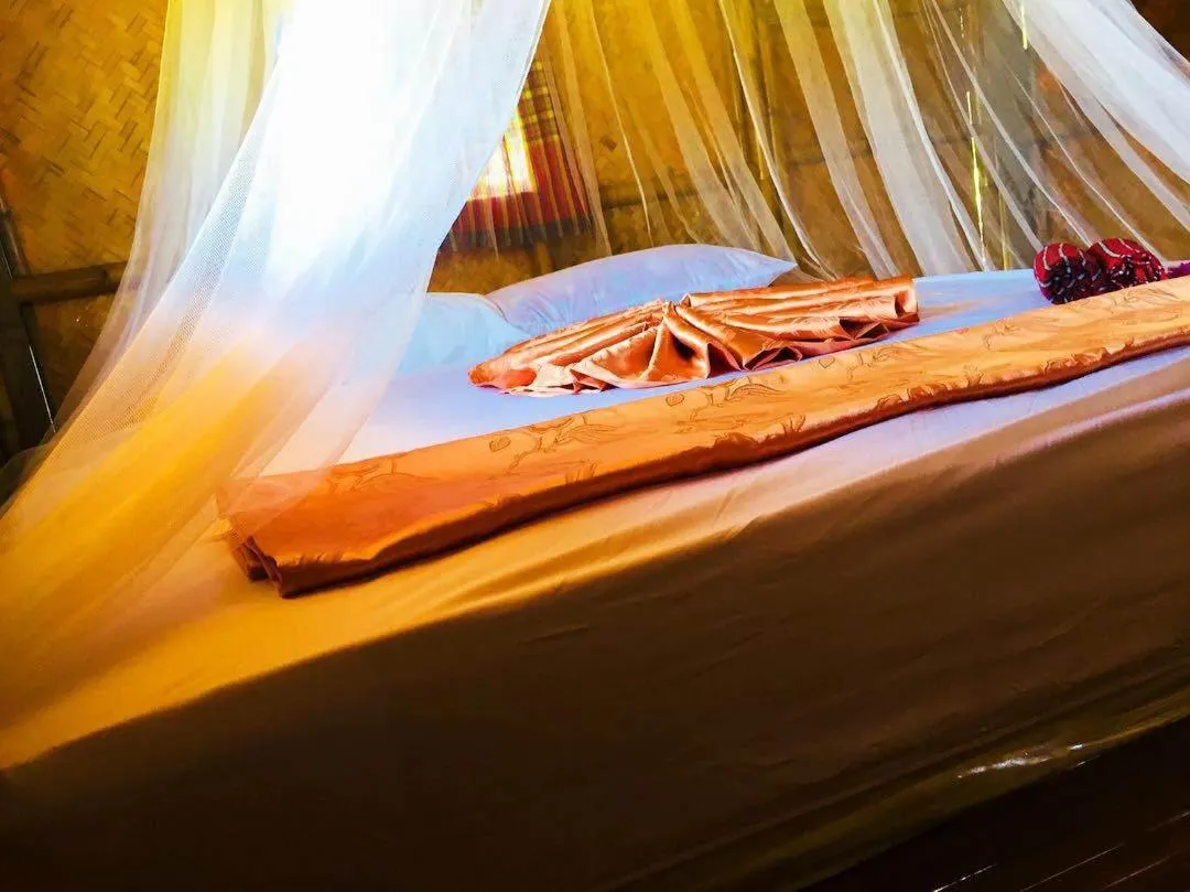 Bed in Koh Phaluai Beach Bangalow