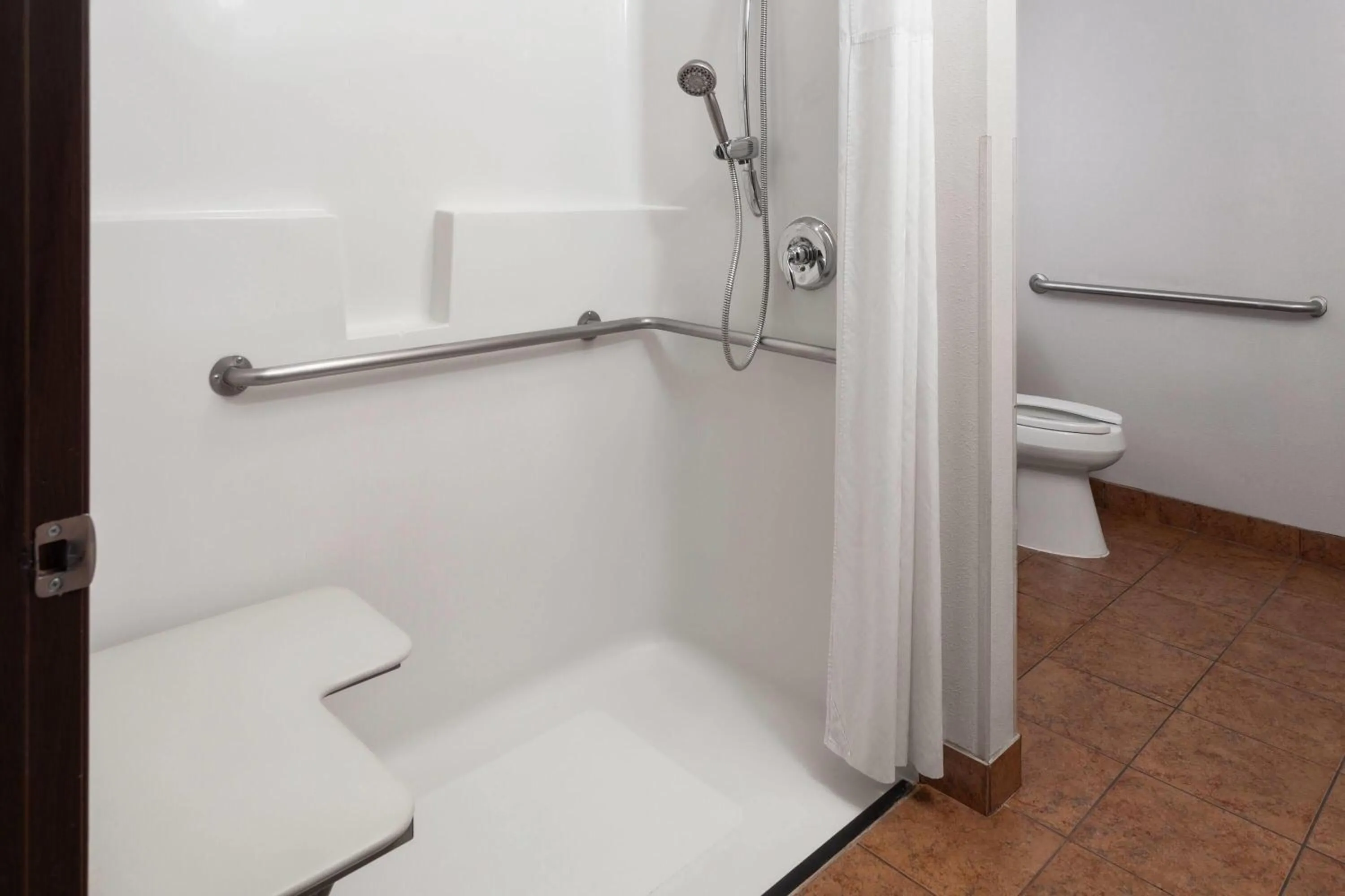 Photo of the whole room in Days Inn & Suites by Wyndham Spokane Airport Airway Heights