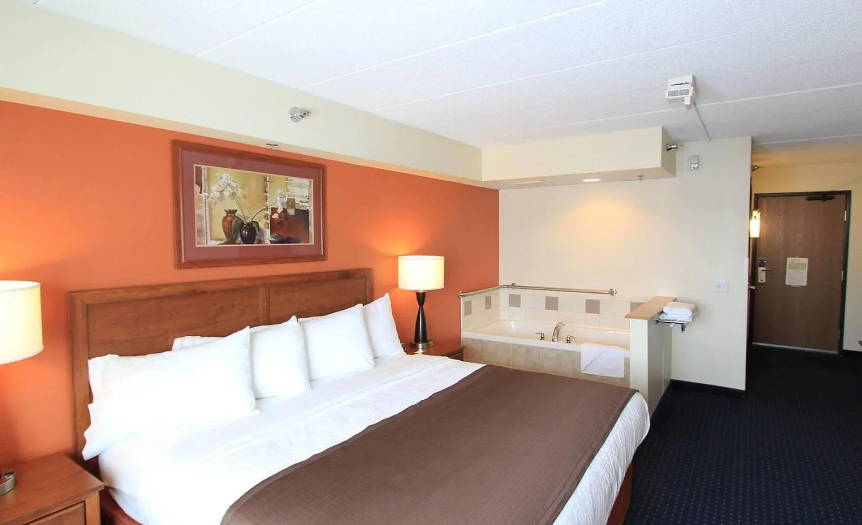 Photo of the whole room, Bed in AmericInn by Wyndham Cedar Rapids Airport