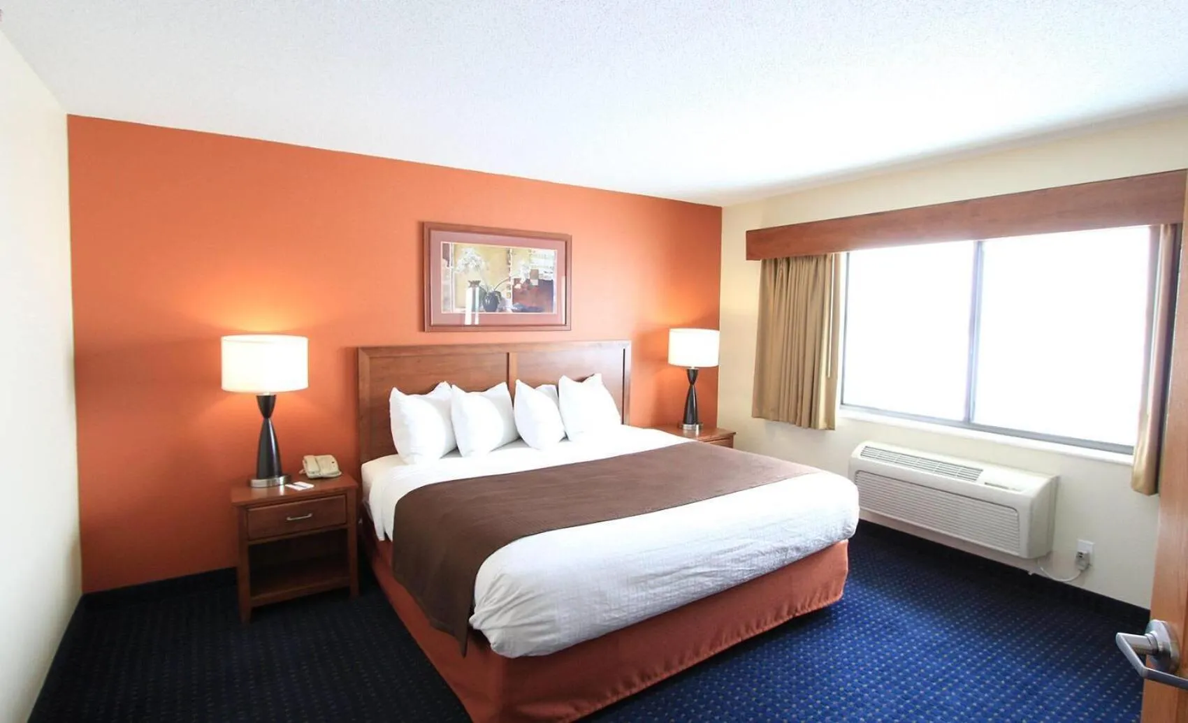 Photo of the whole room, Bed in AmericInn by Wyndham Cedar Rapids Airport