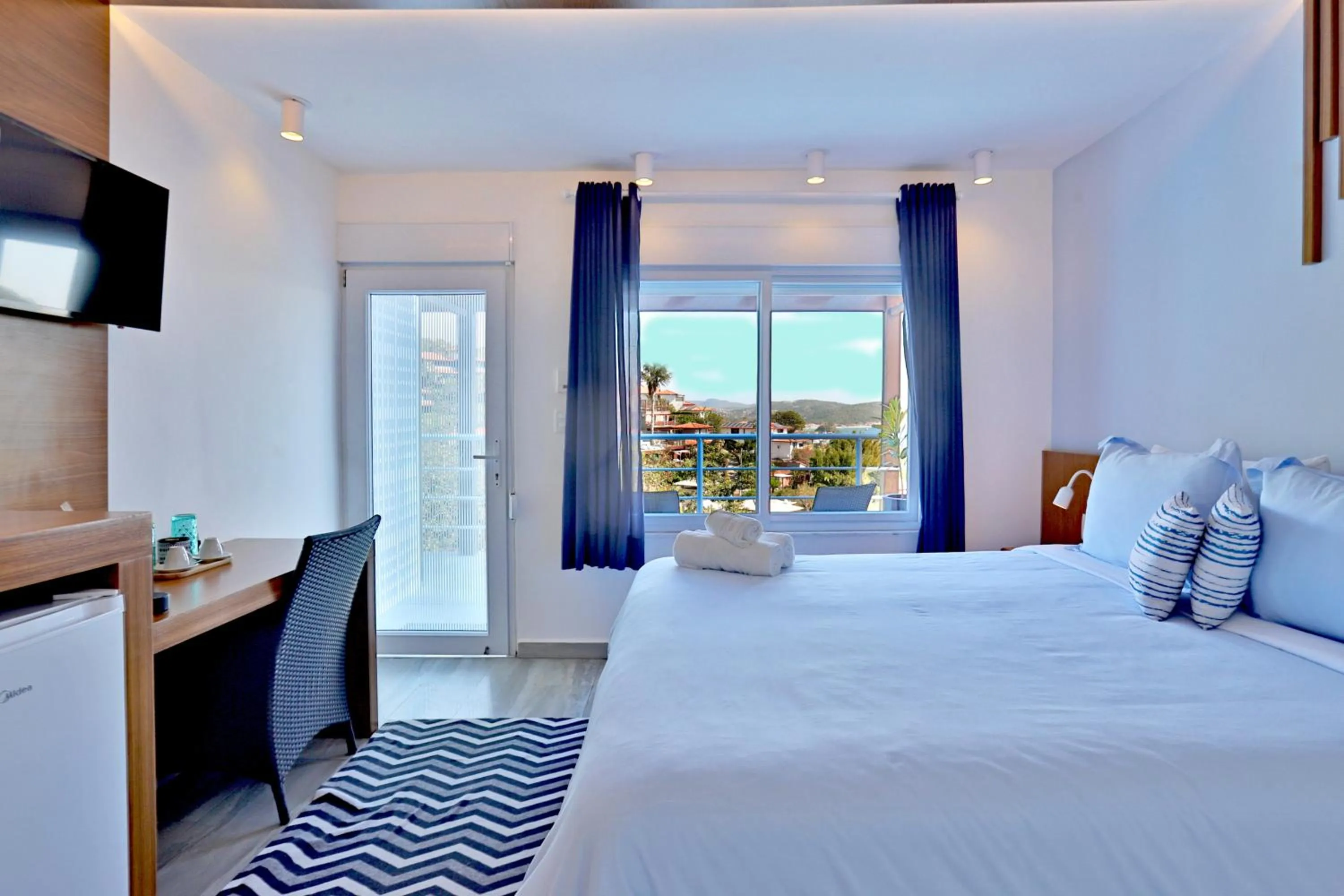 Bed in Pousada Santorini