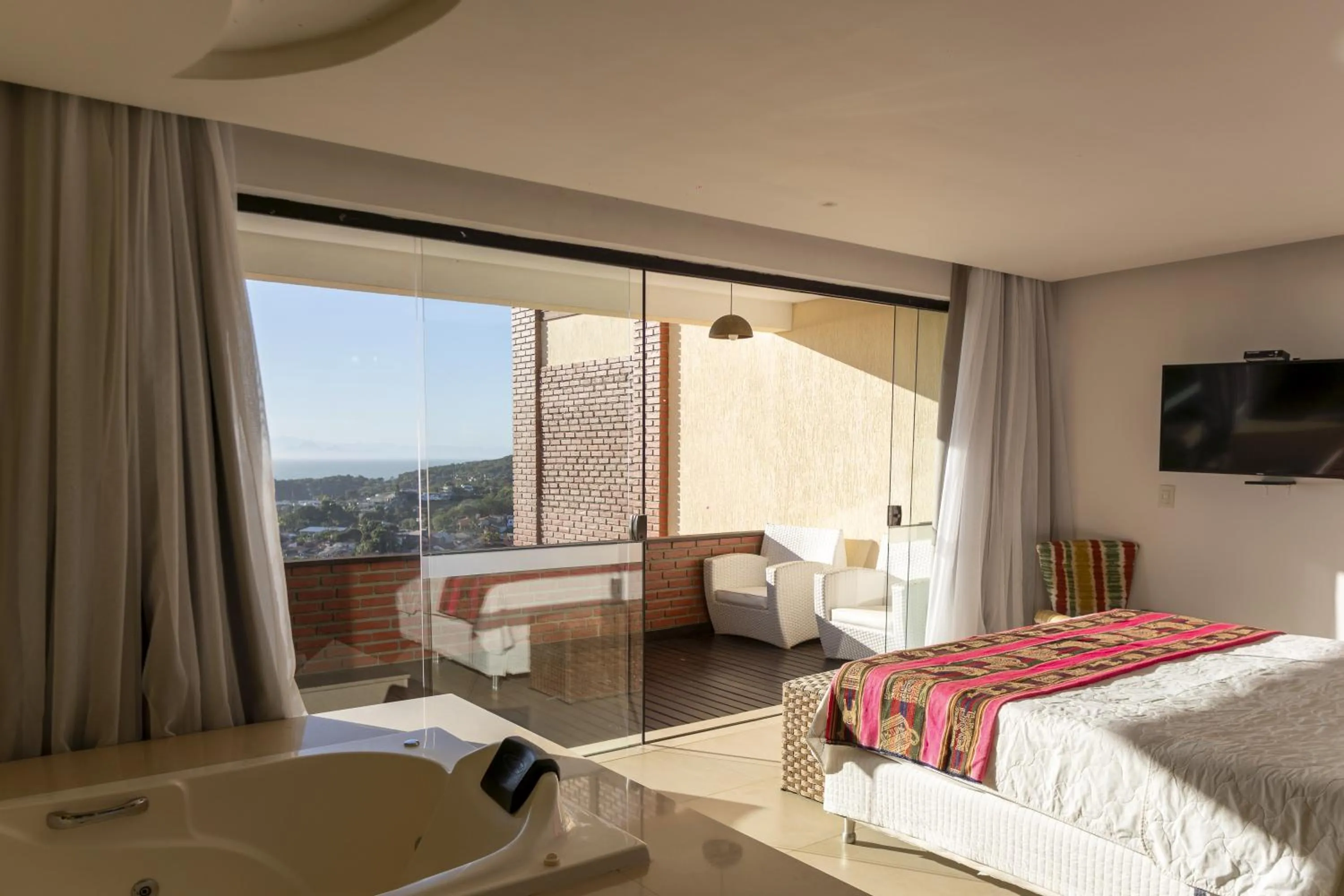 Photo of the whole room, Bed in Costa do Sol Boutique Hotel