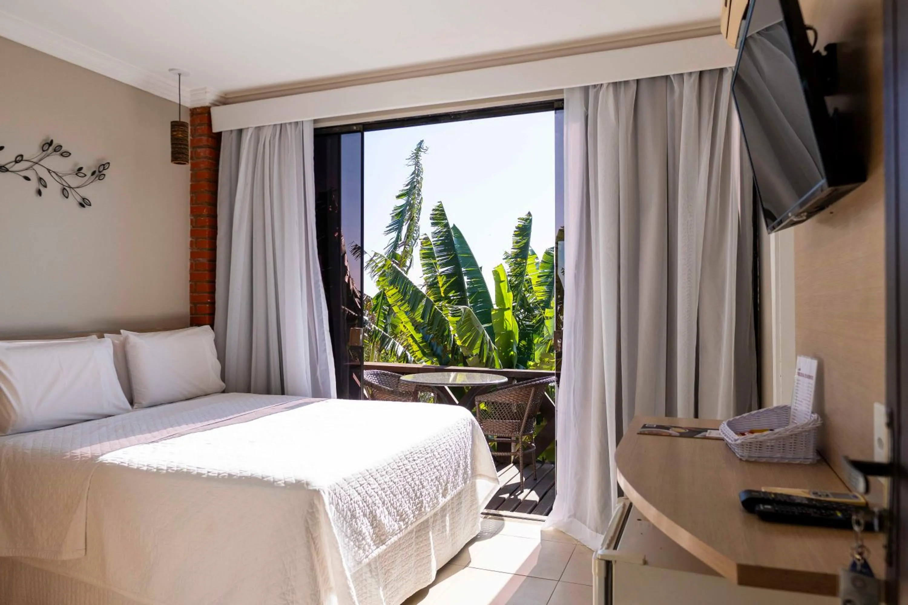 TV and multimedia, Bed in Costa do Sol Boutique Hotel