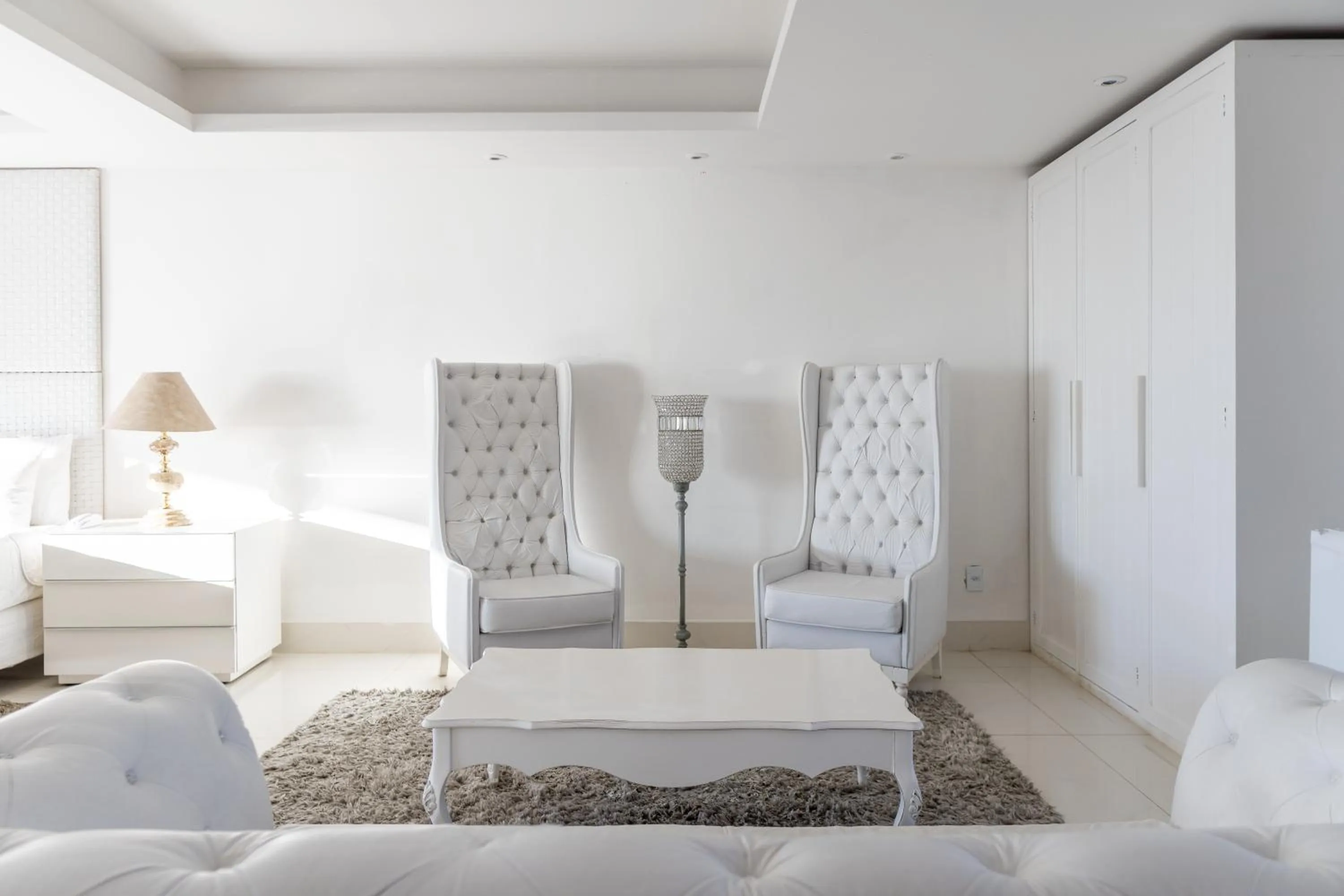 Living room, Bed in Costa do Sol Boutique Hotel