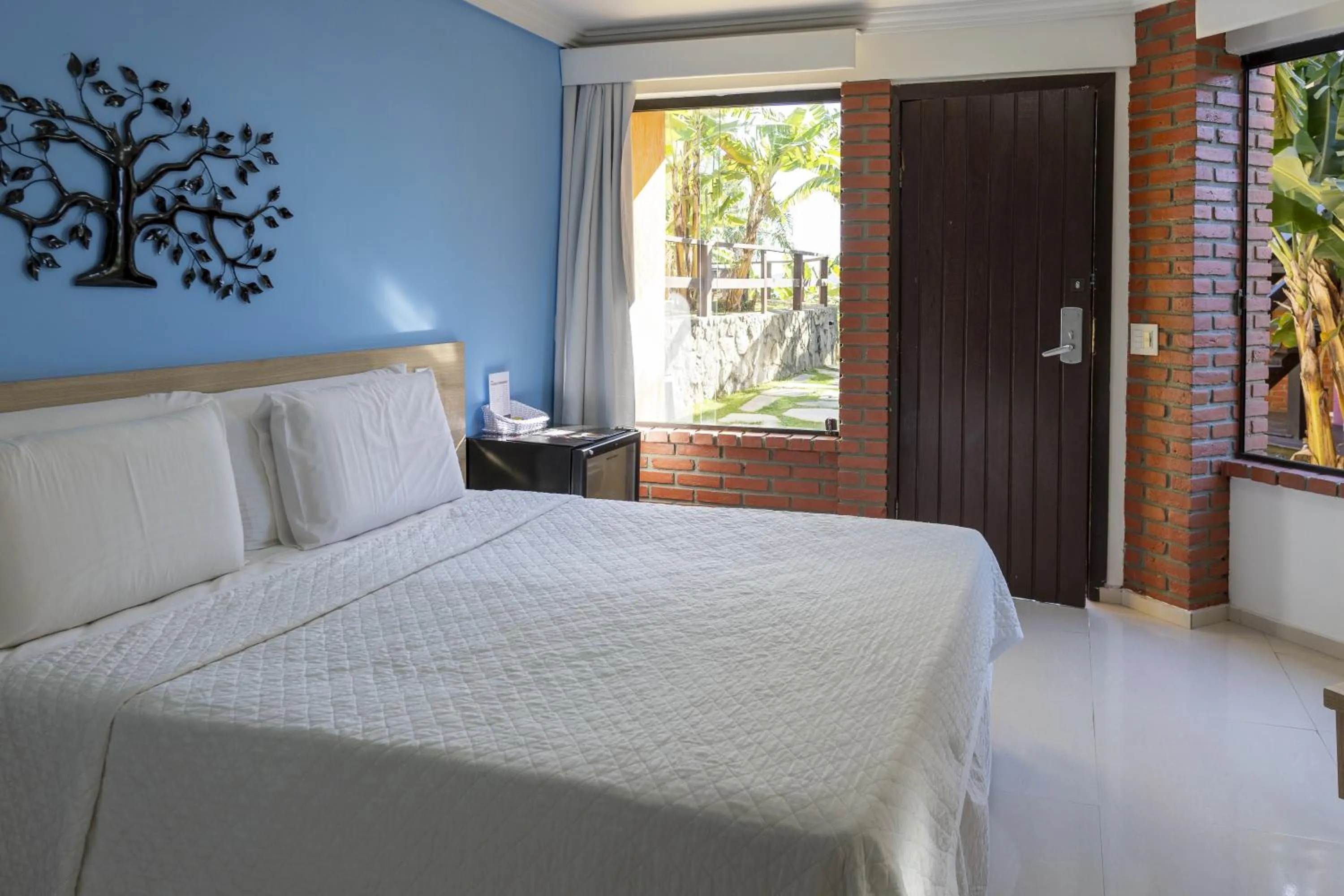Bed in Costa do Sol Boutique Hotel