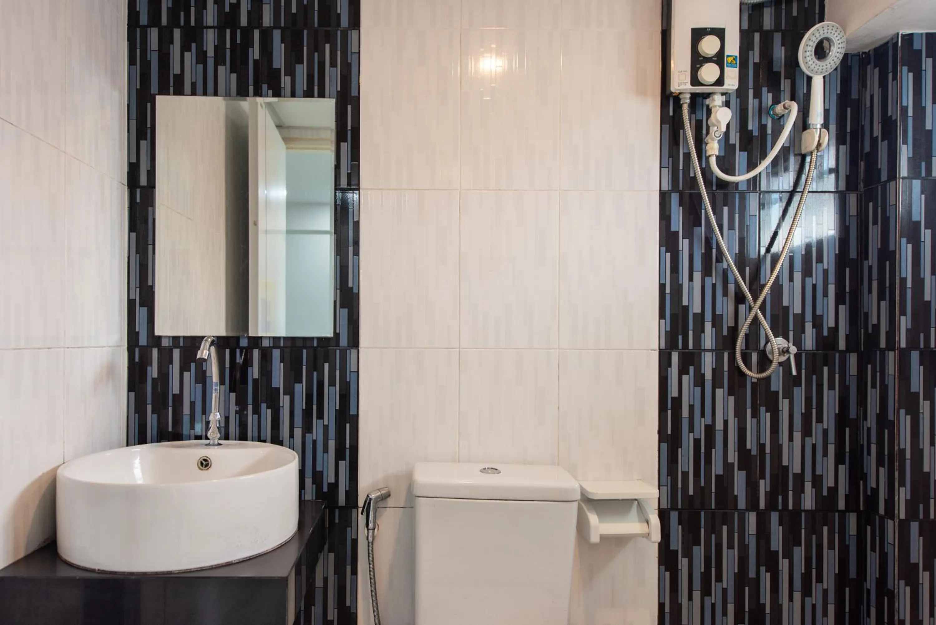 Bathroom in Riski Residence Bangbuathong