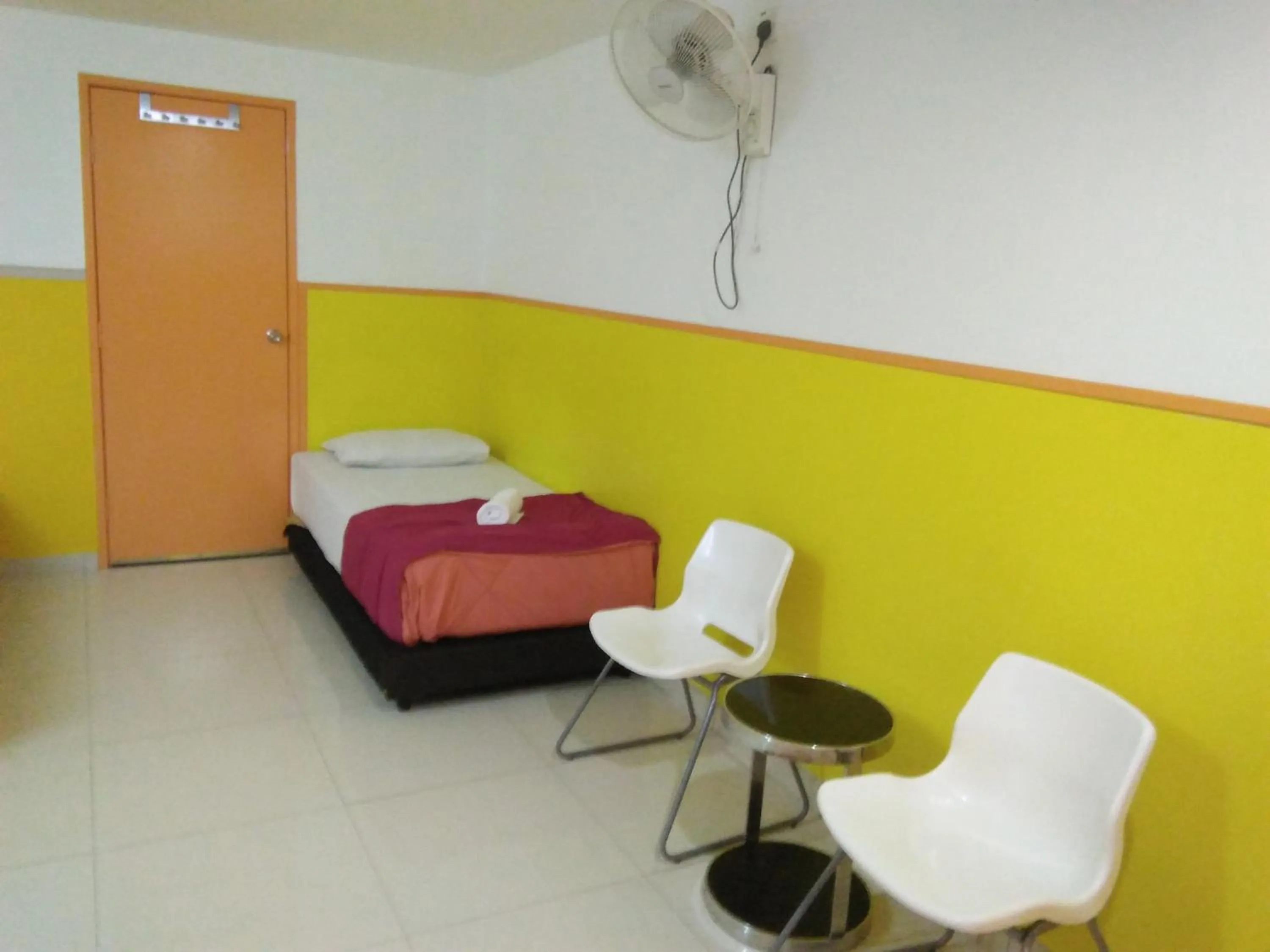 Seating area, Bed in Hotel Abby IGB Tasek