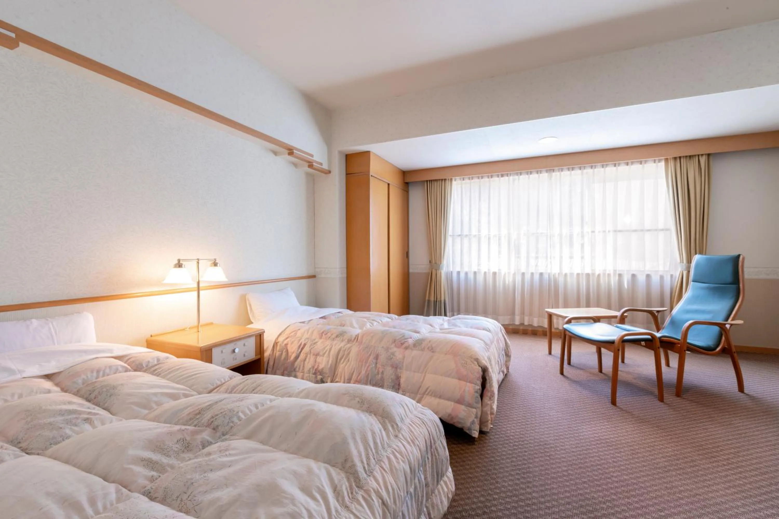 Photo of the whole room, Bed in Noboribetsu Sekisui Tei