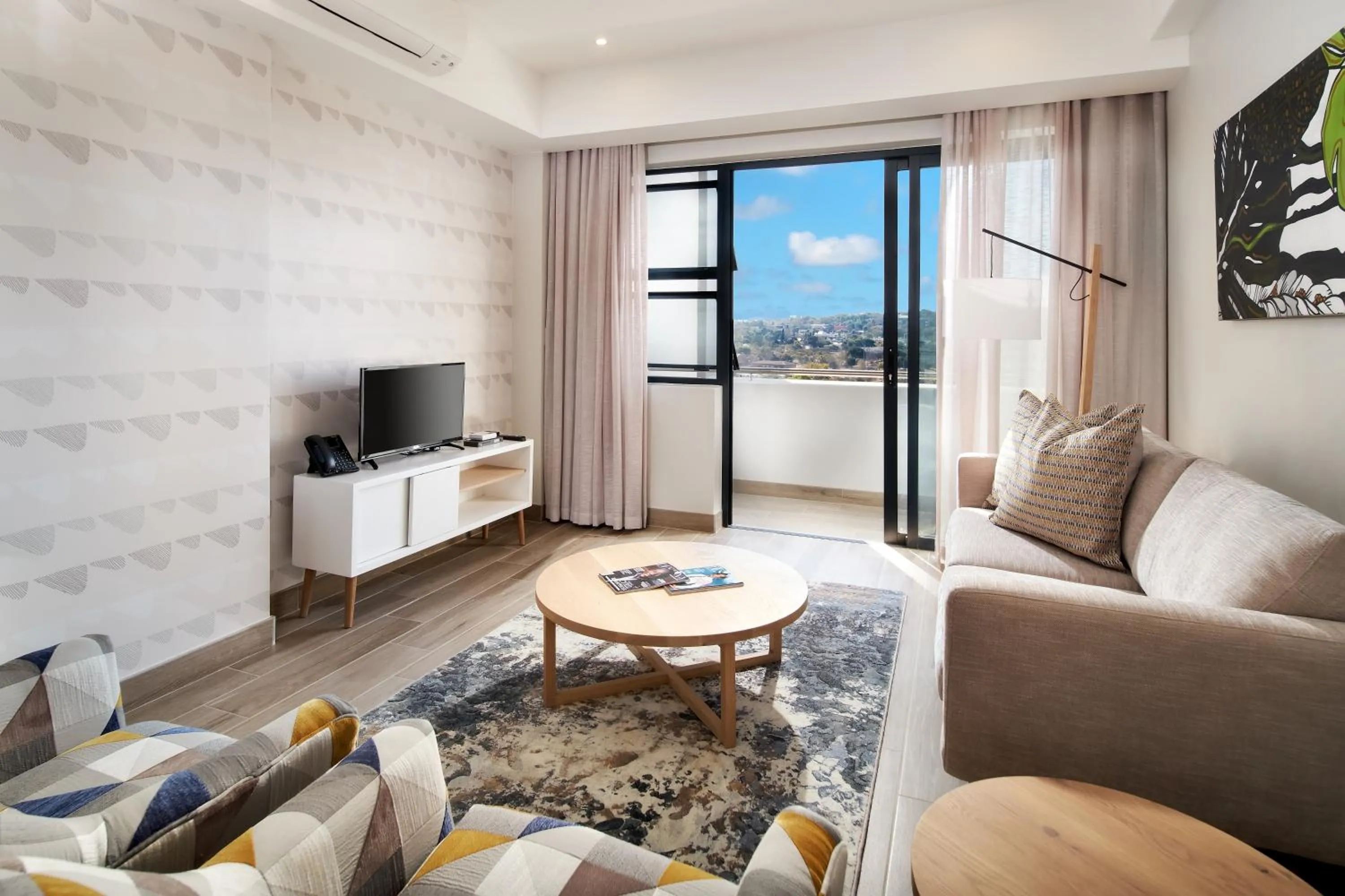 Living room in The Regency Apartment Hotel Menlyn