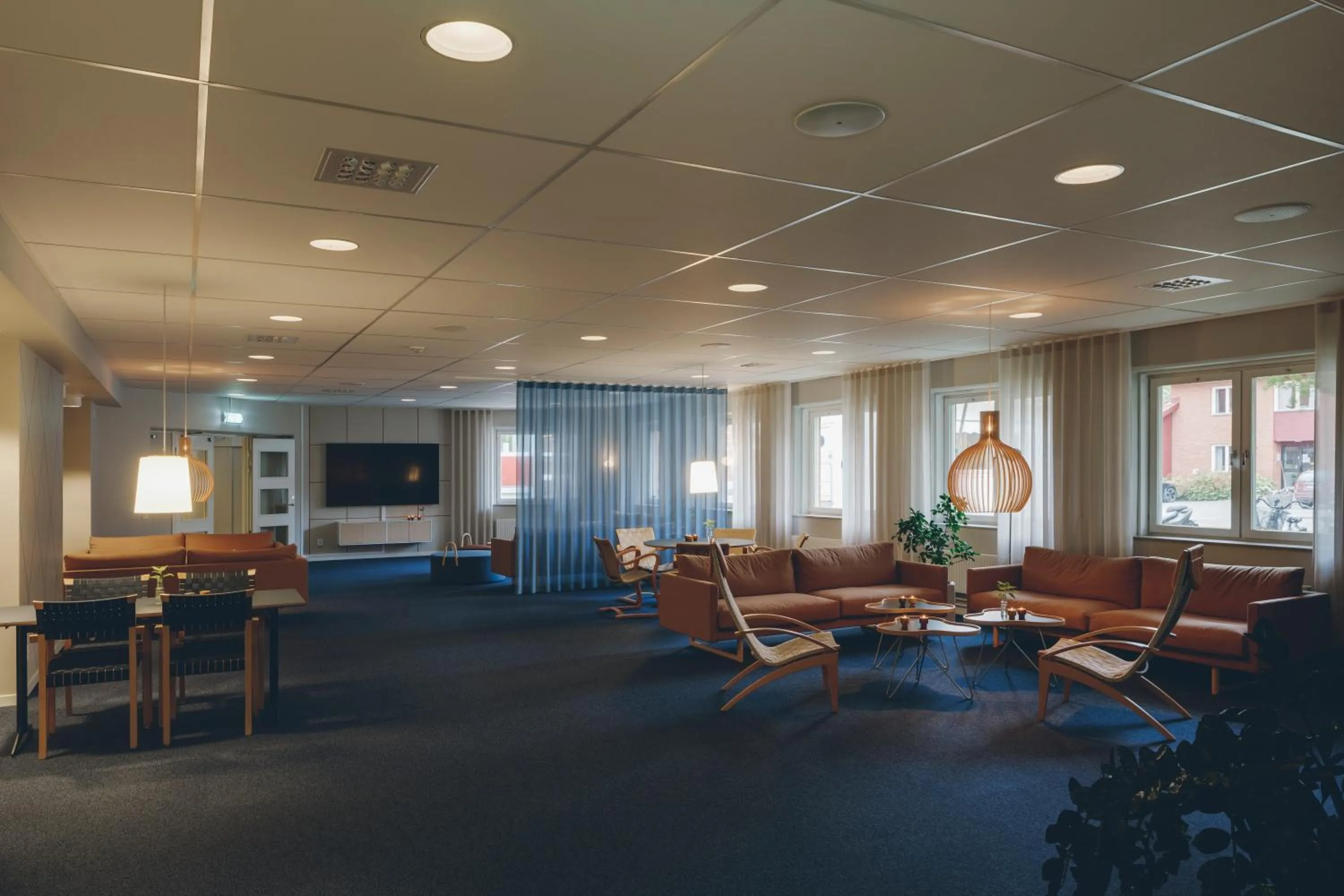 Communal lounge/ TV room in Medlefors Hotell & Konferens