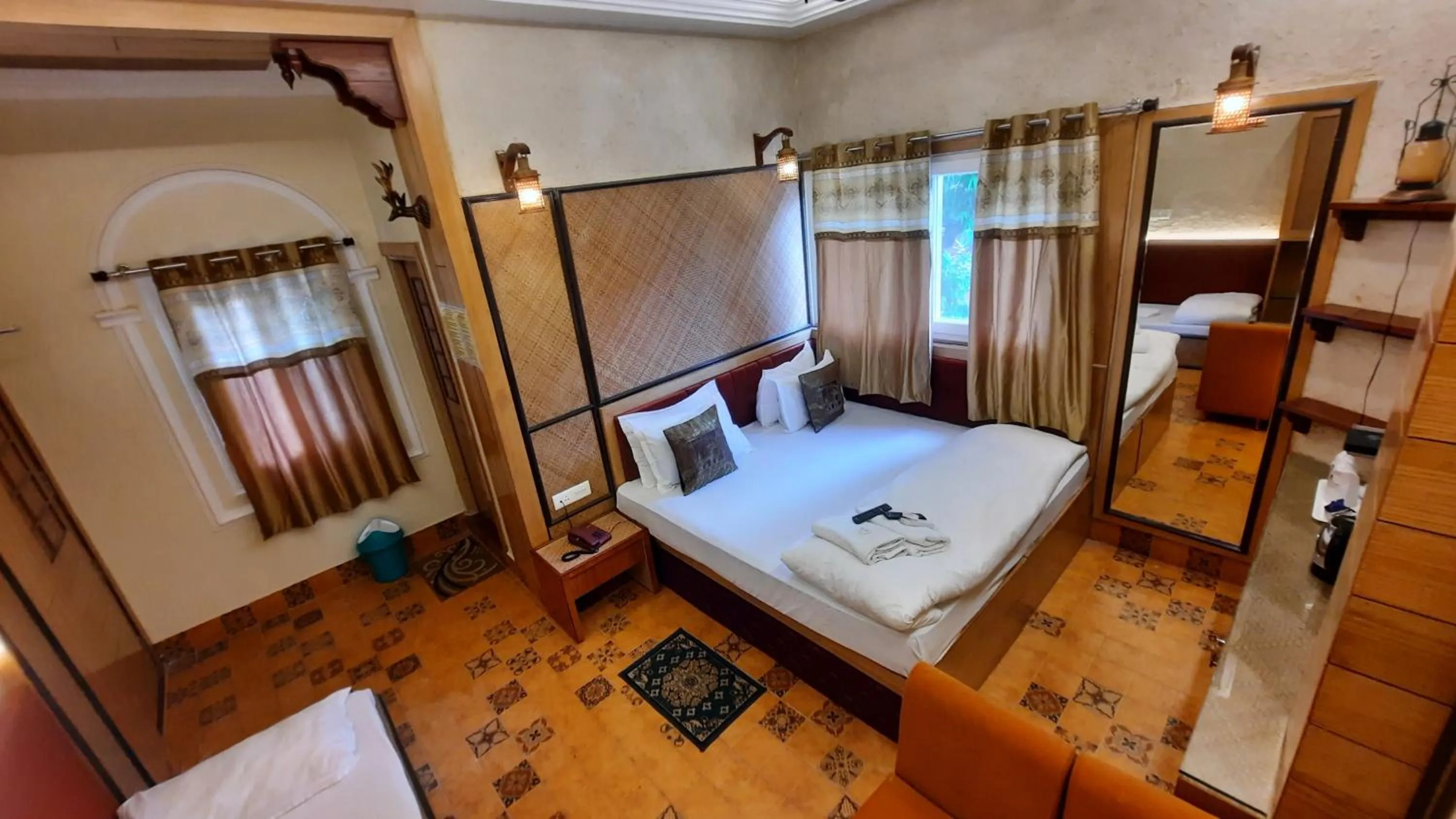 towels, Bed in Hotel Temple On Ganges