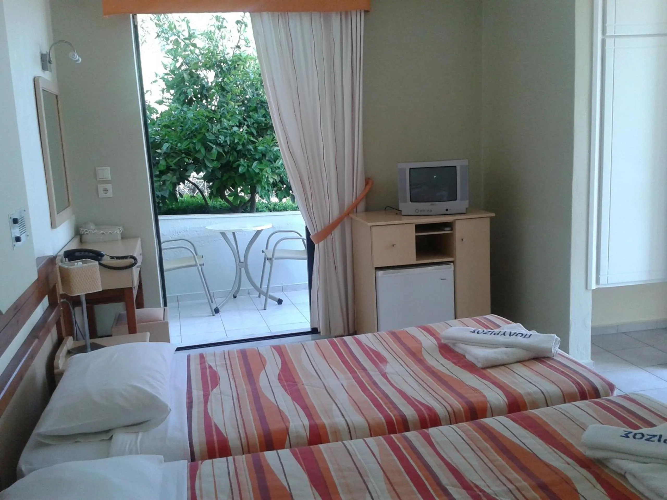 Photo of the whole room, Bed in Polyrizos Hotel