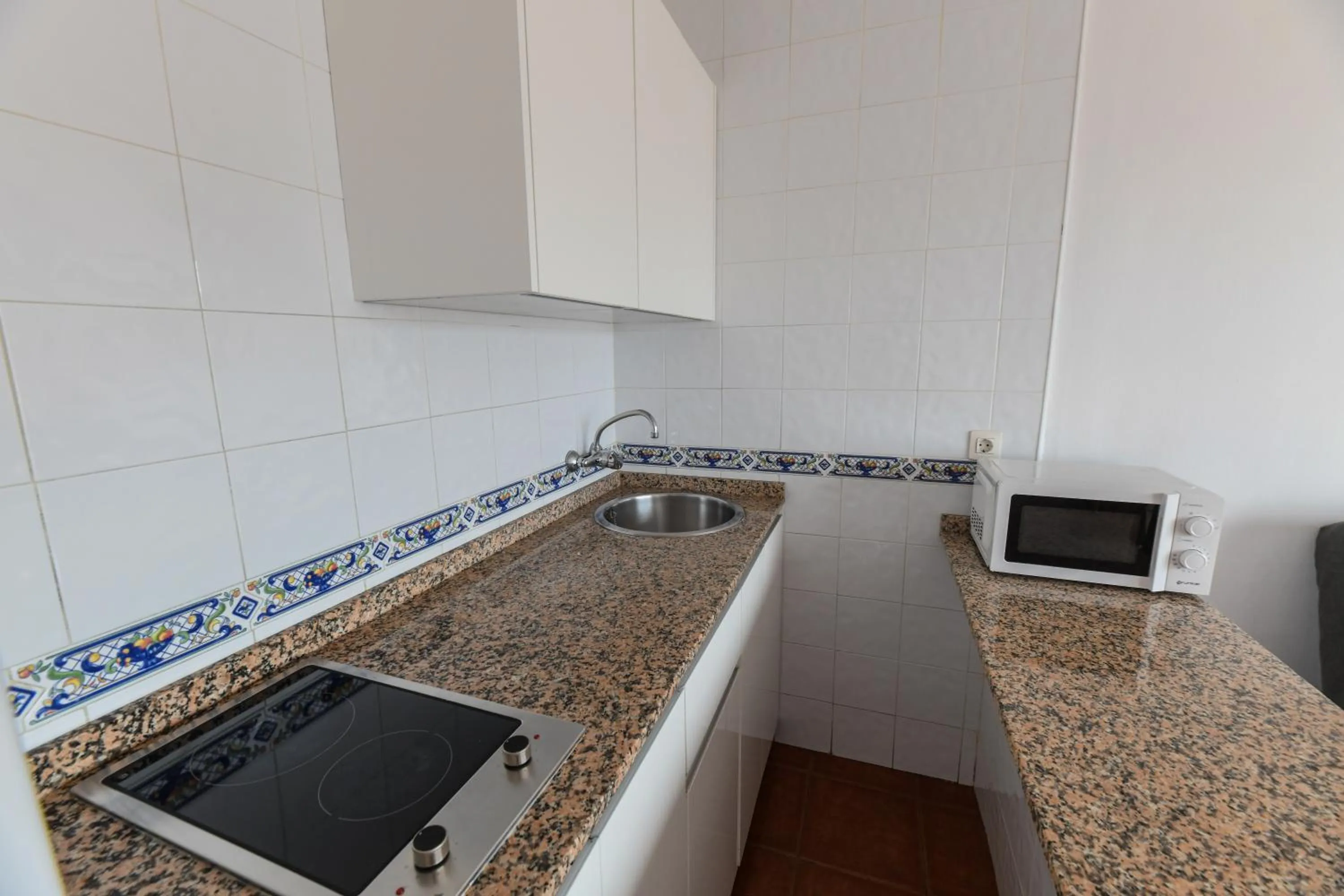 Kitchen or kitchenette in Apartamentos LIVVO Puerto Bello