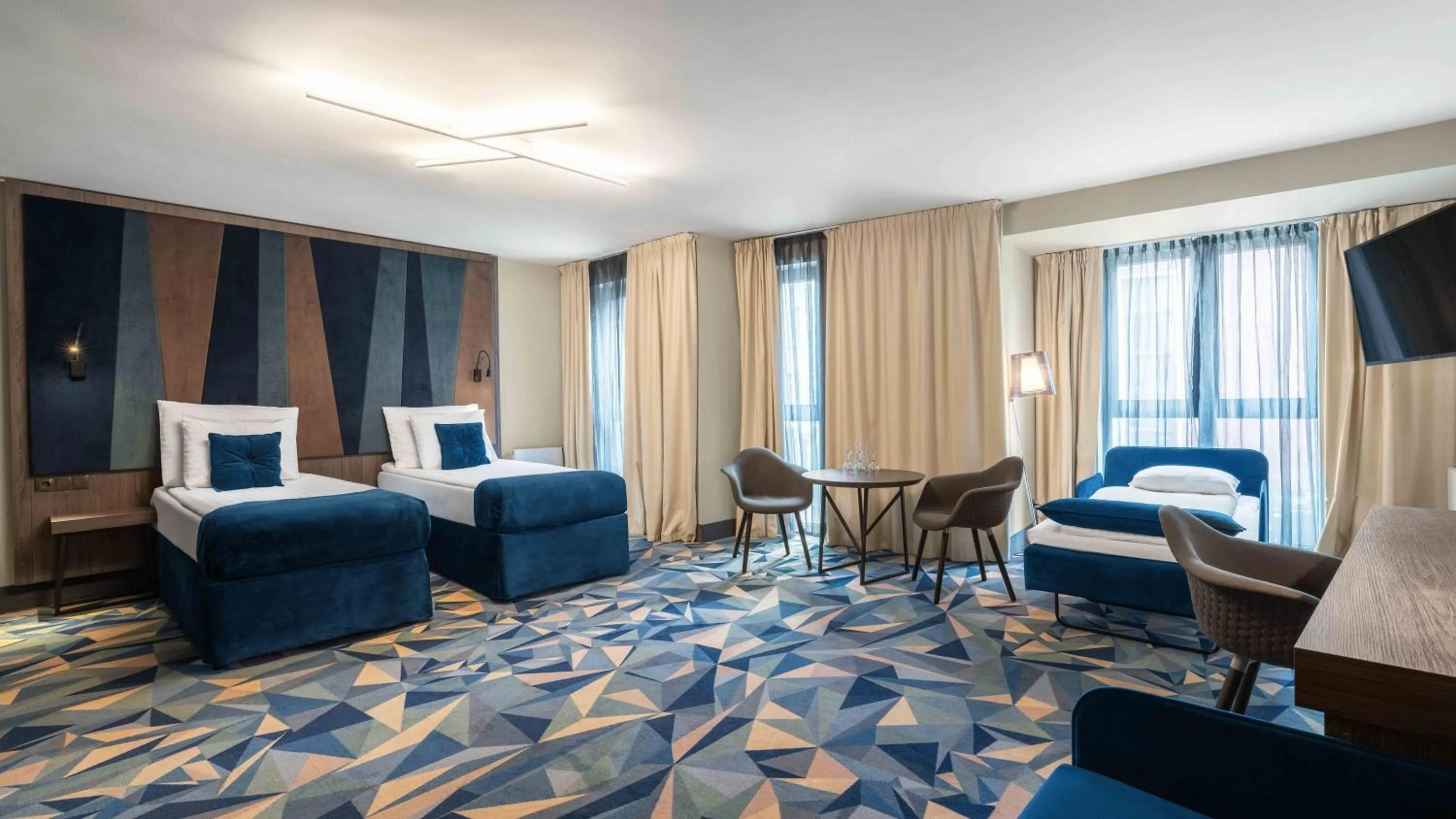 Bed in Wellton Riverside SPA Hotel