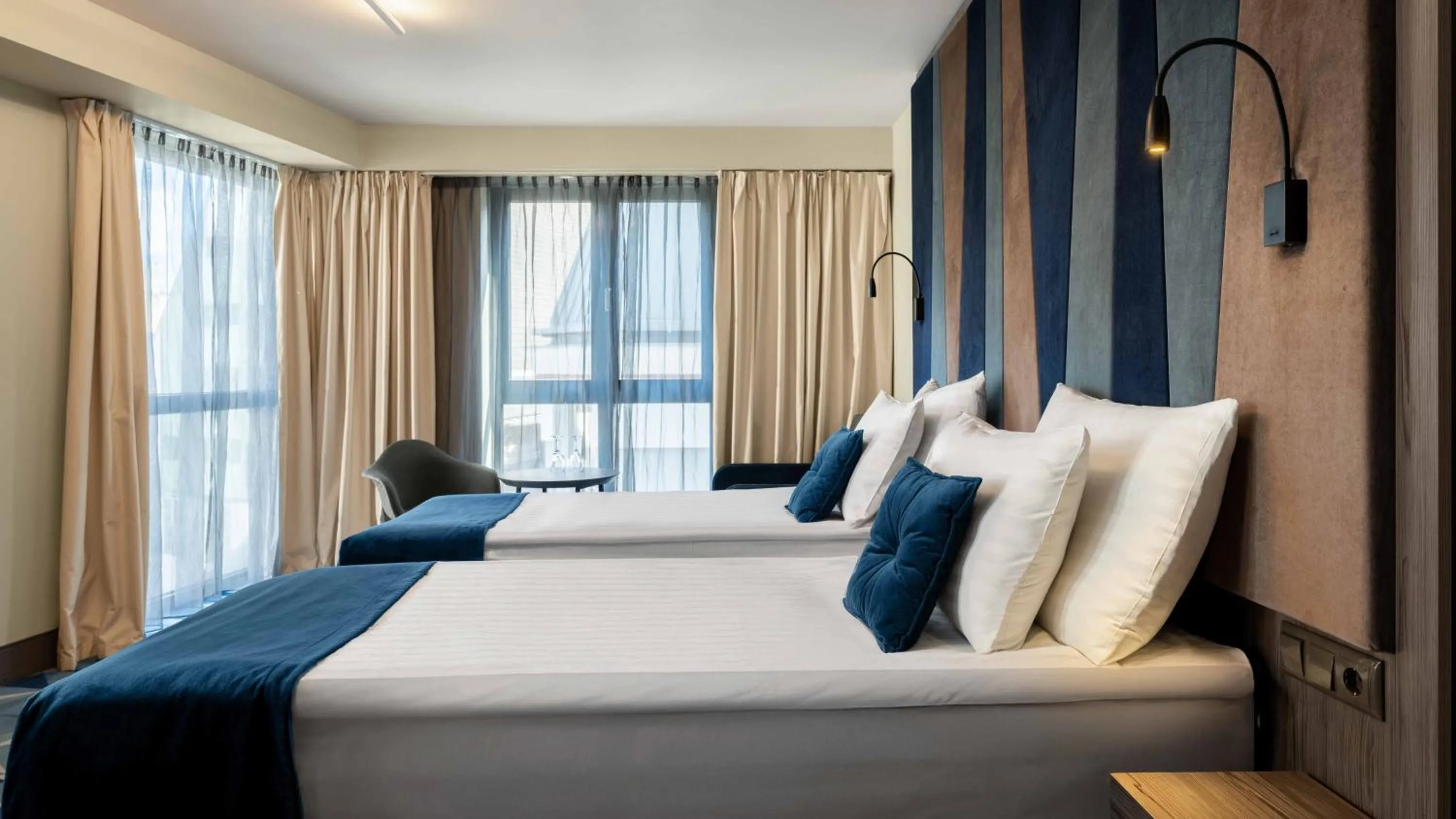 Bed in Wellton Riverside SPA Hotel