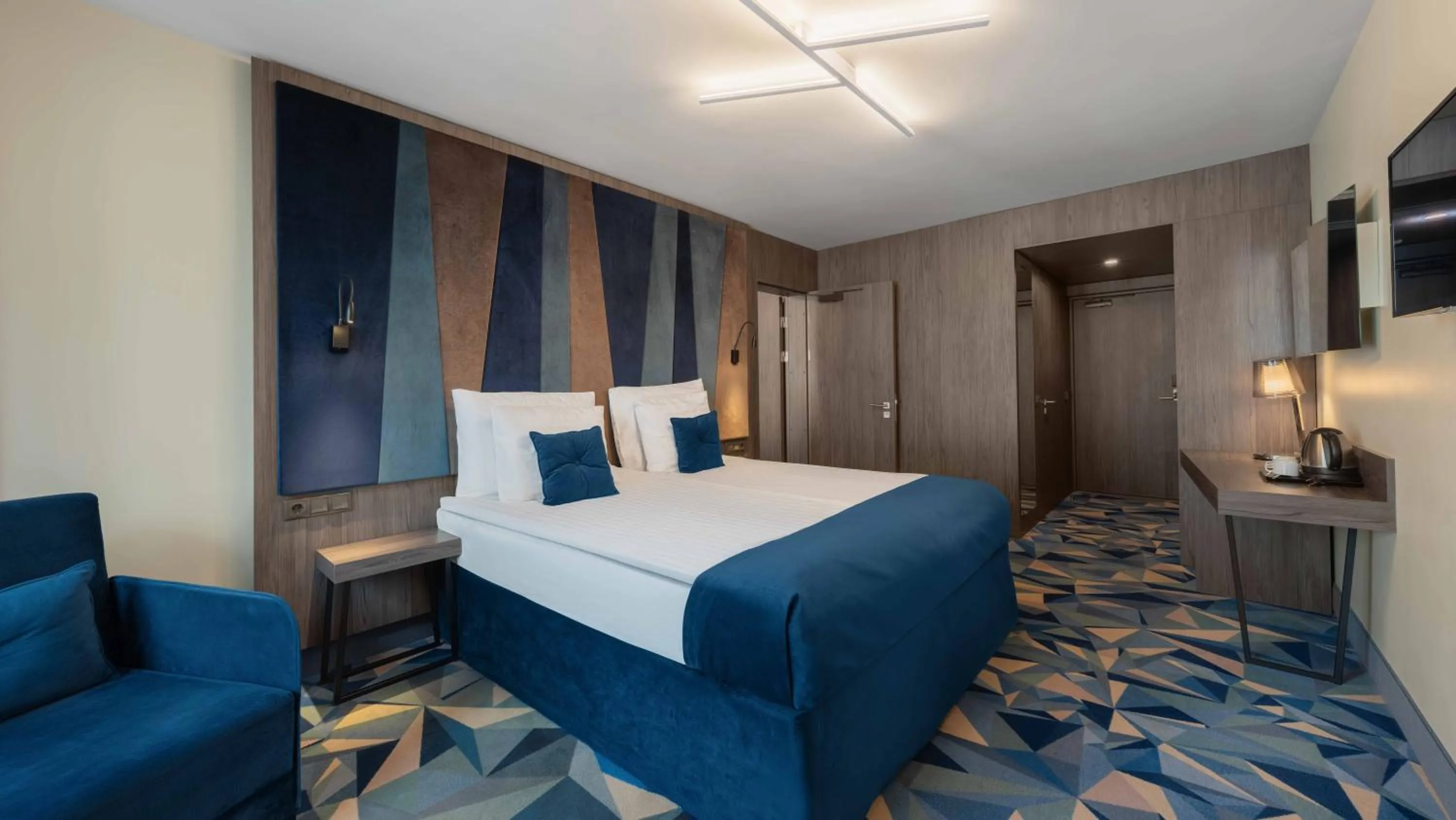 Bed in Wellton Riverside SPA Hotel