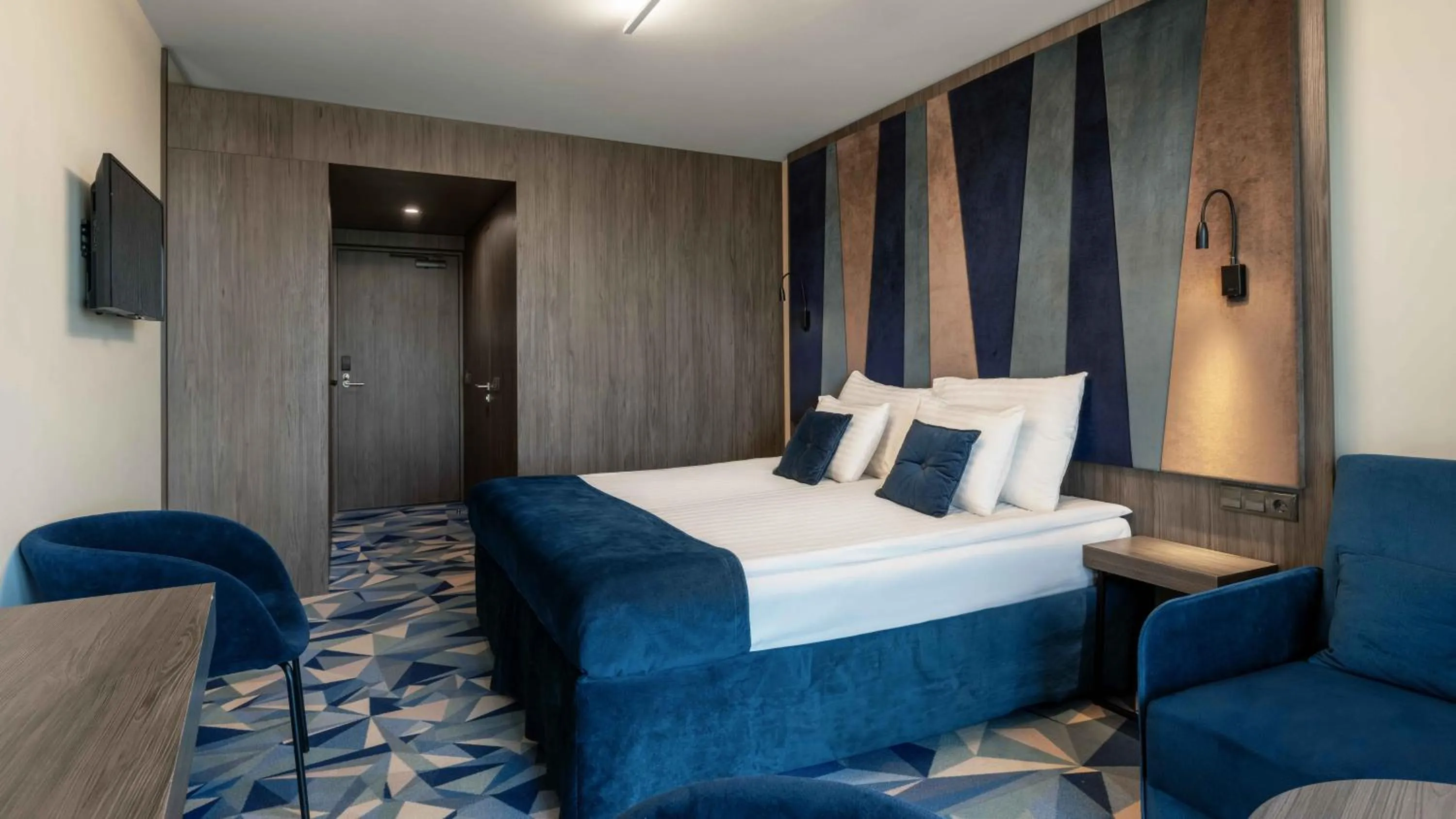 Bed in Wellton Riverside SPA Hotel