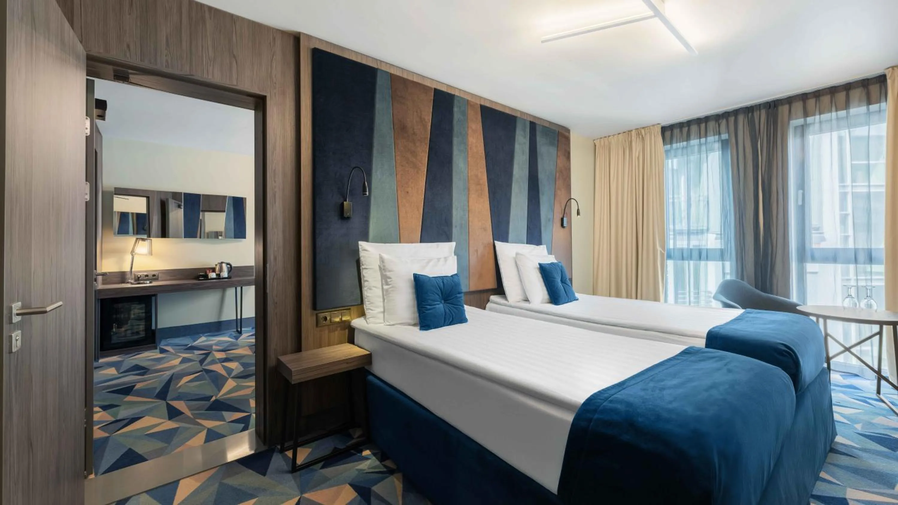 Bed in Wellton Riverside SPA Hotel