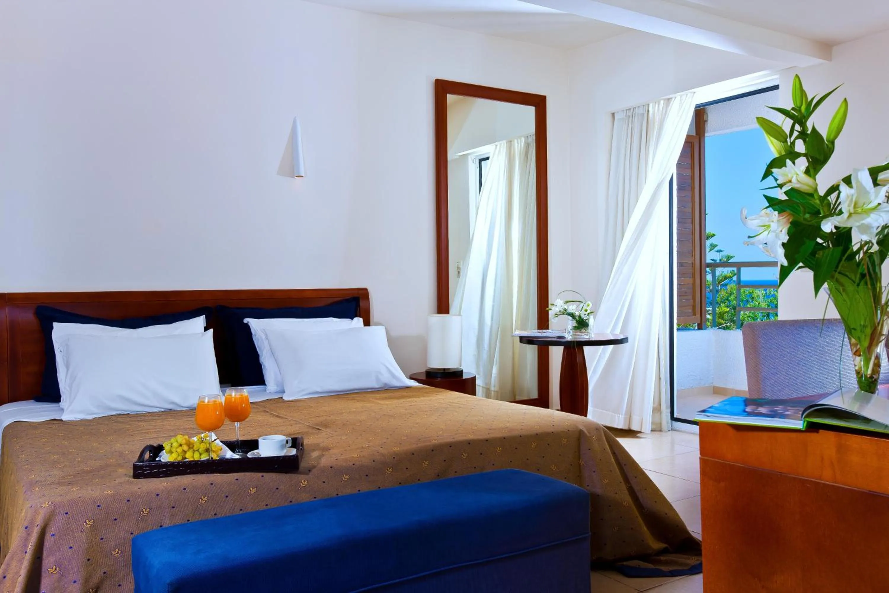 Bed in Apollonia Beach Resort & Spa