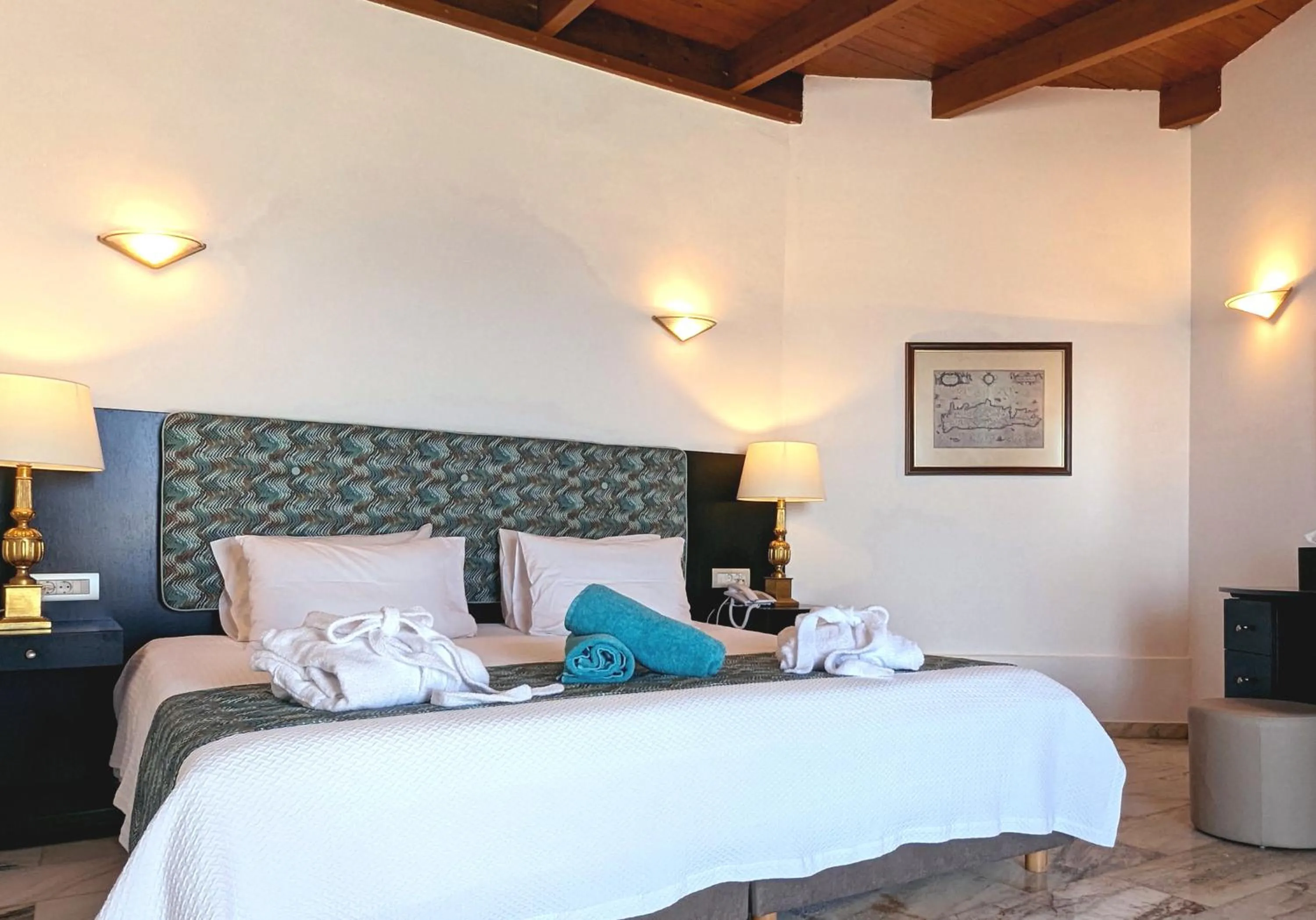 Bed in Apollonia Beach Resort & Spa