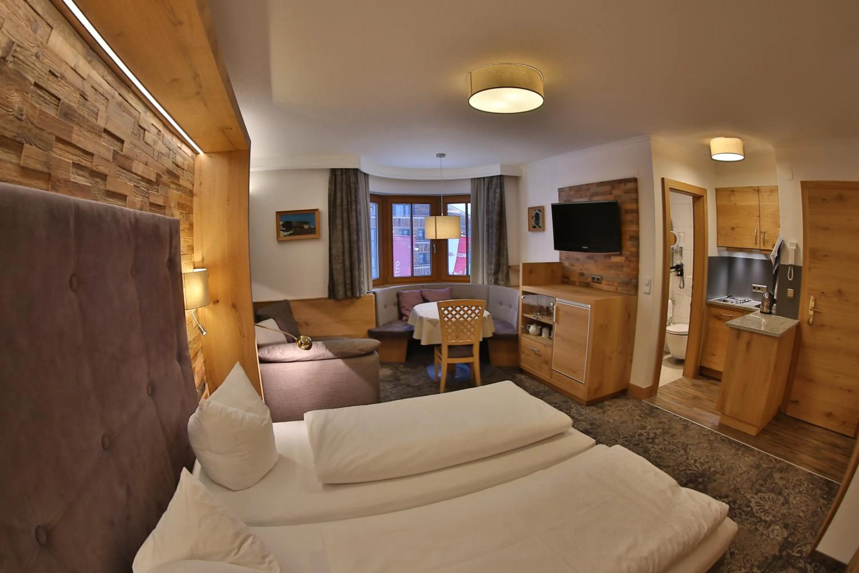 Living room, Bed in Aparthotel Acksteiner