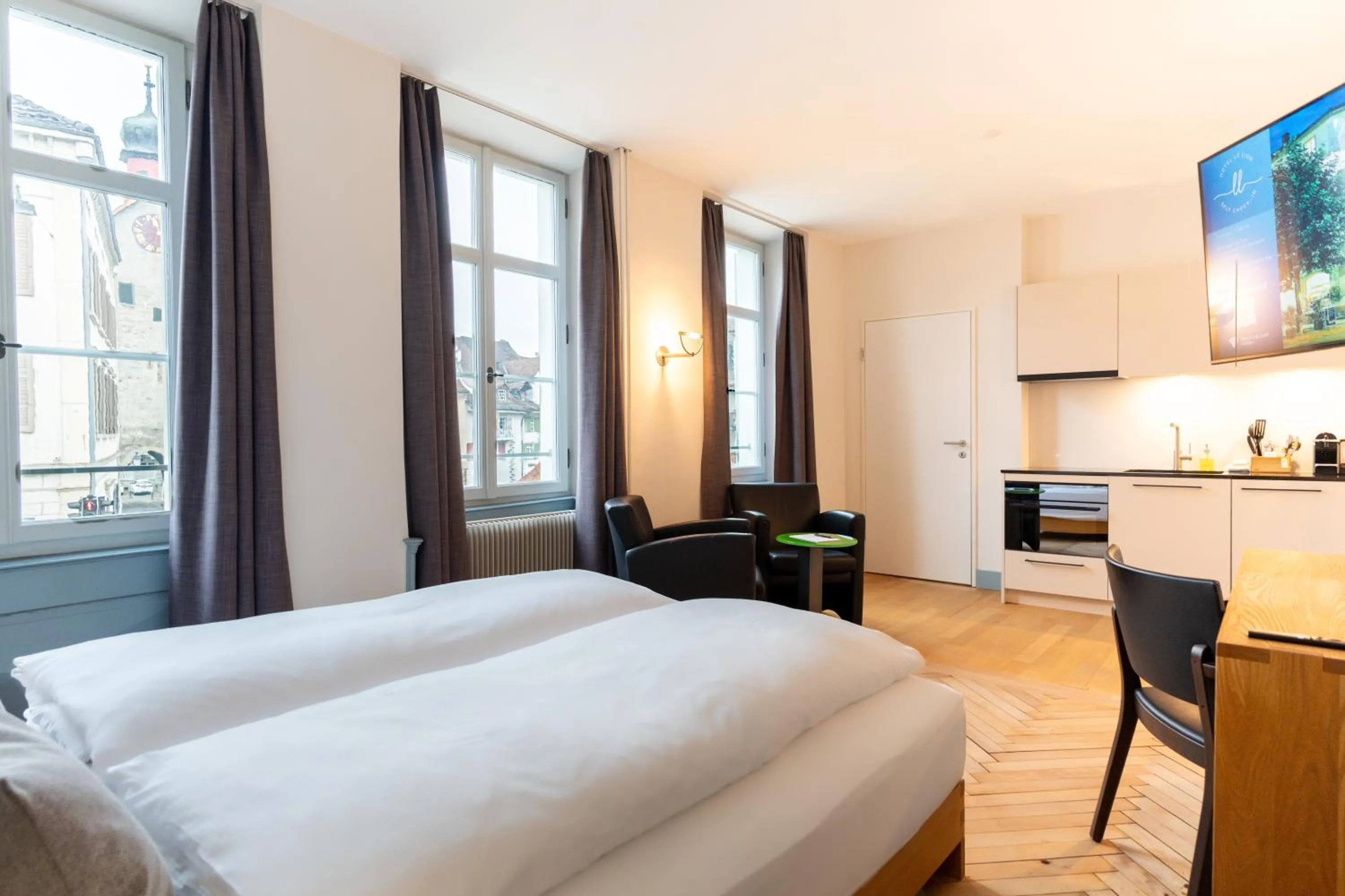 Bed in Hotel Le Lion - Self Check-in