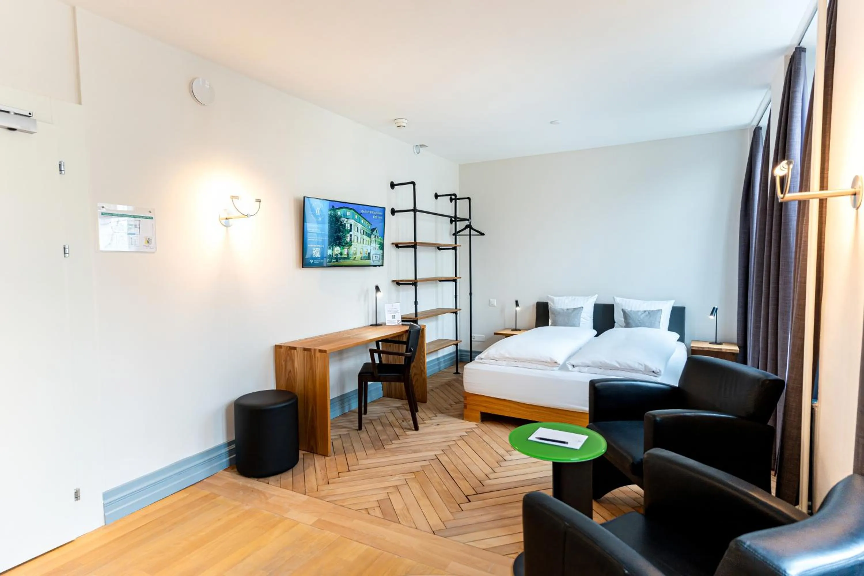 Bed in Hotel Le Lion - Self Check-in