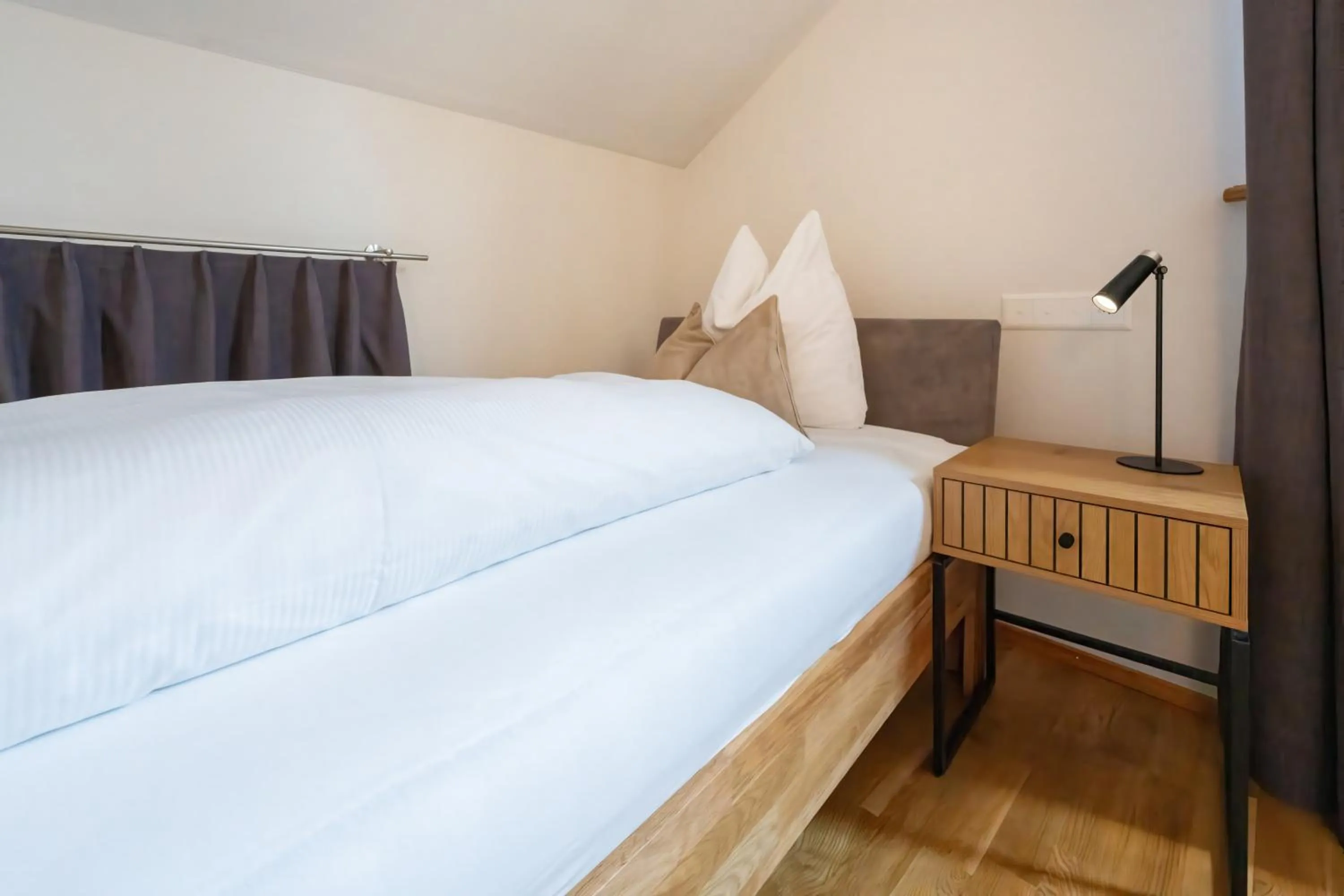 Bed in Hotel Le Lion - Self Check-in