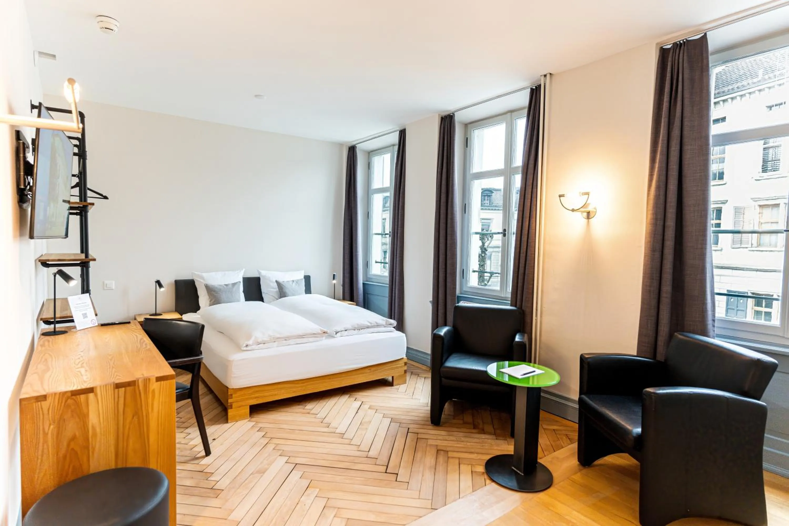 Bed in Hotel Le Lion - Self Check-in