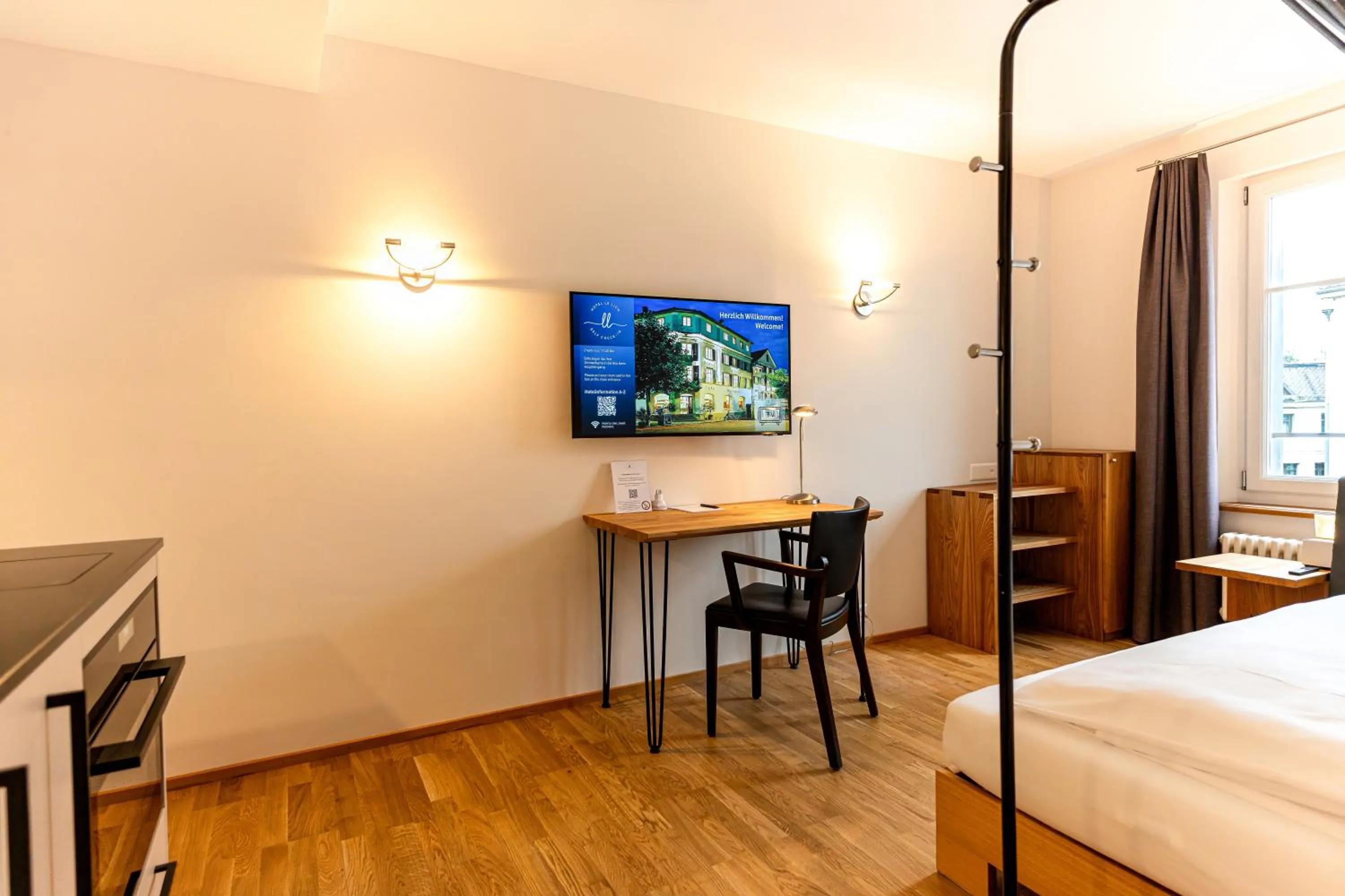 Bed in Hotel Le Lion - Self Check-in