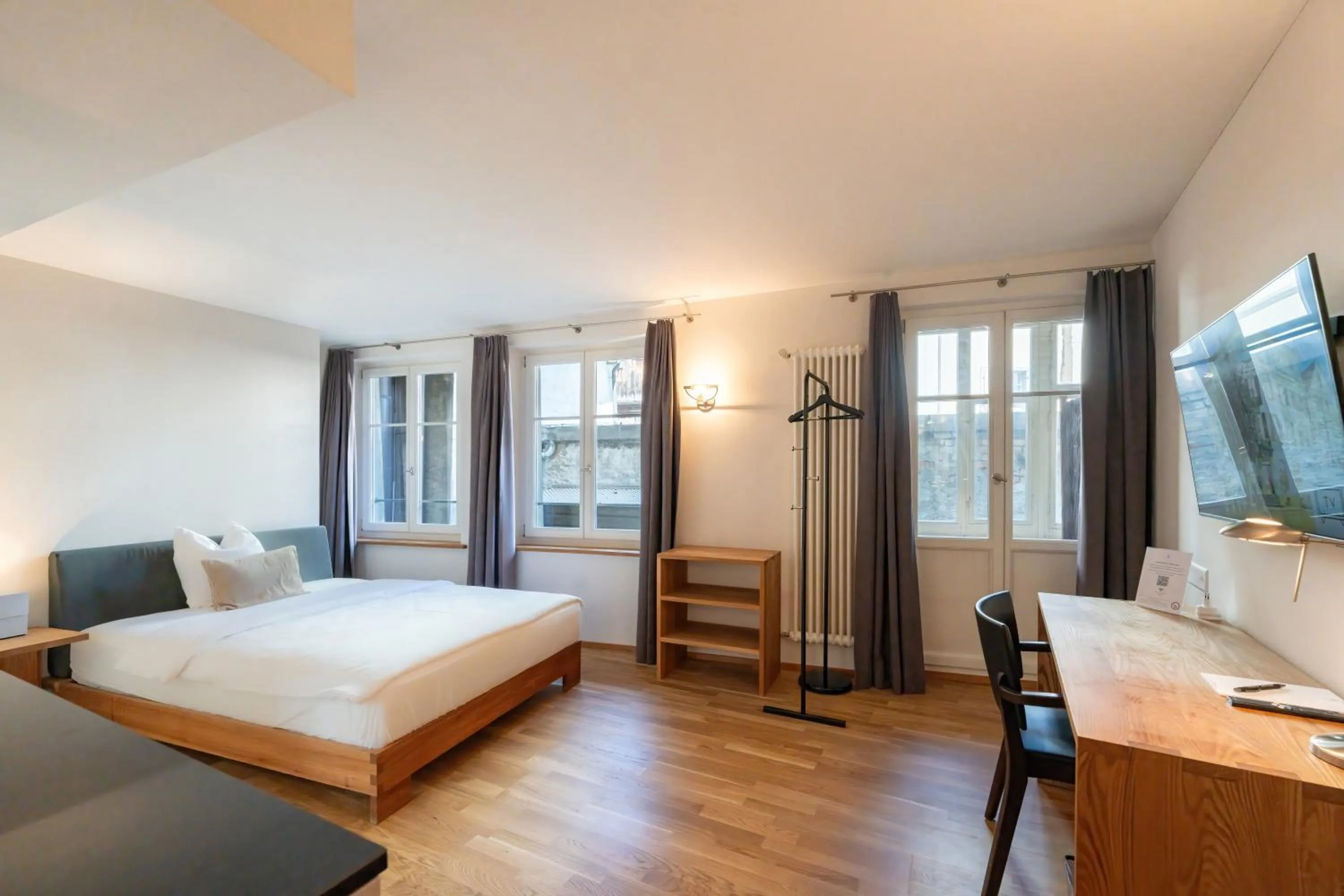 Bed in Hotel Le Lion - Self Check-in