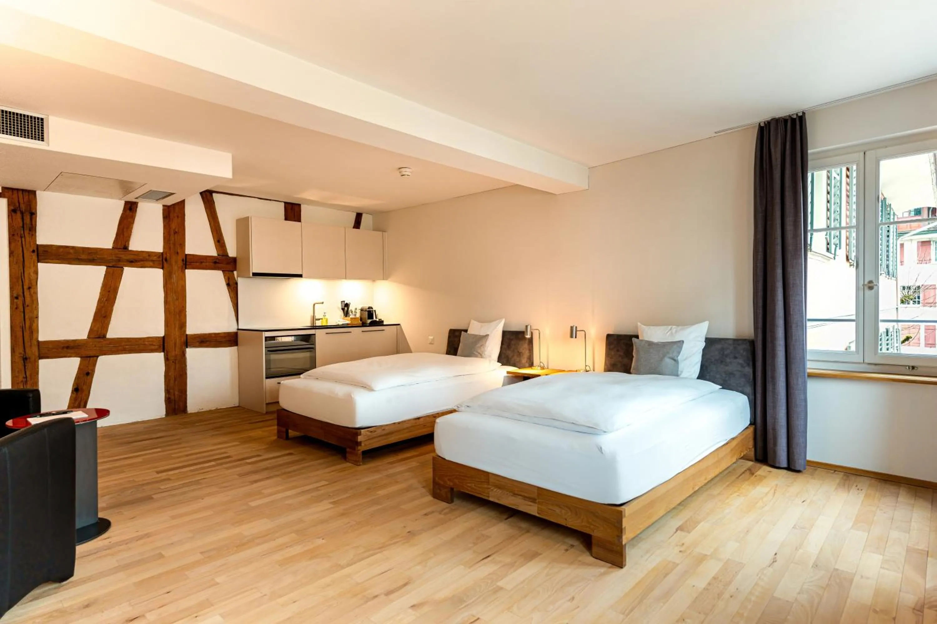 Bed in Hotel Le Lion - Self Check-in