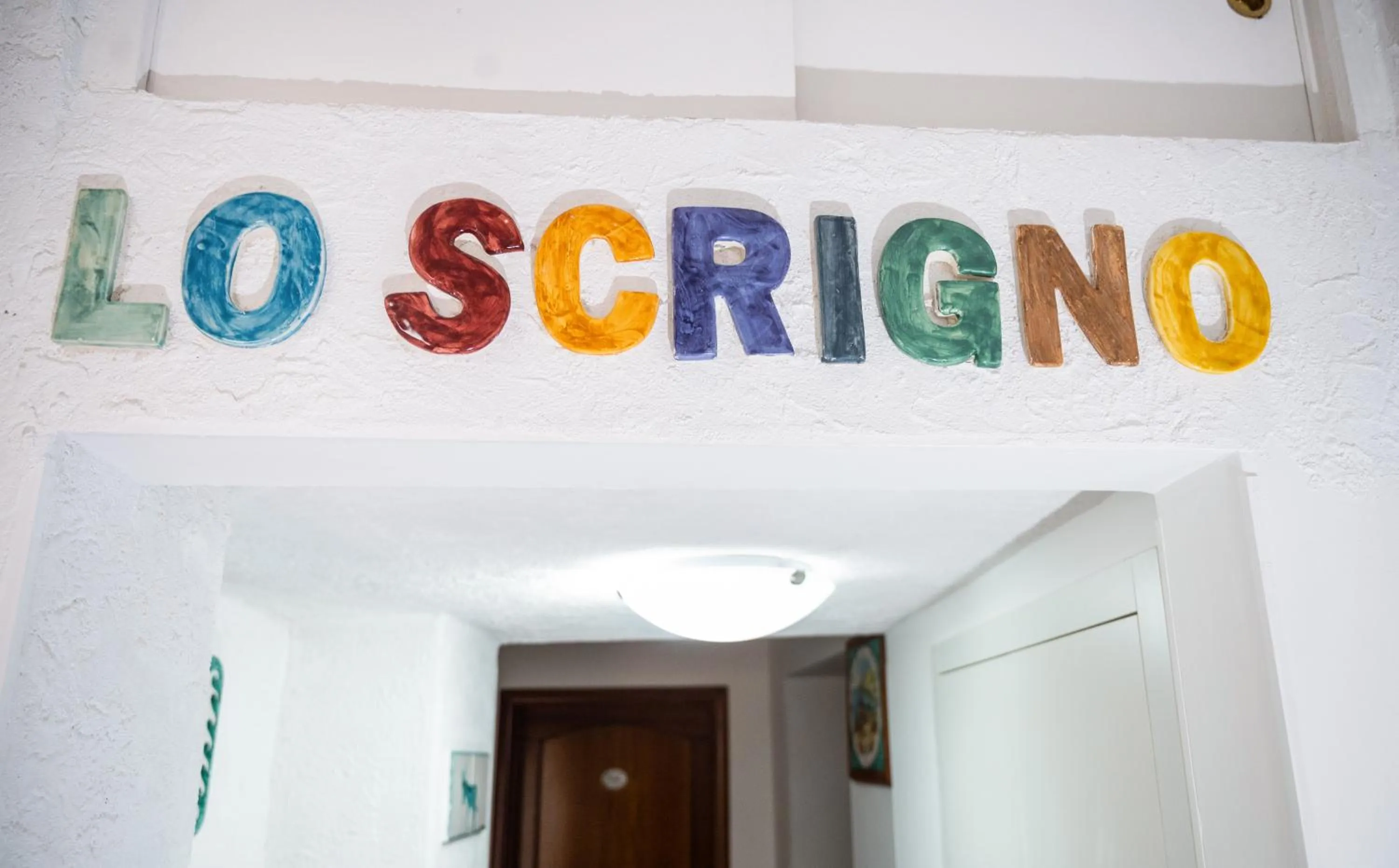 Property logo or sign in Casa Lo Scrigno