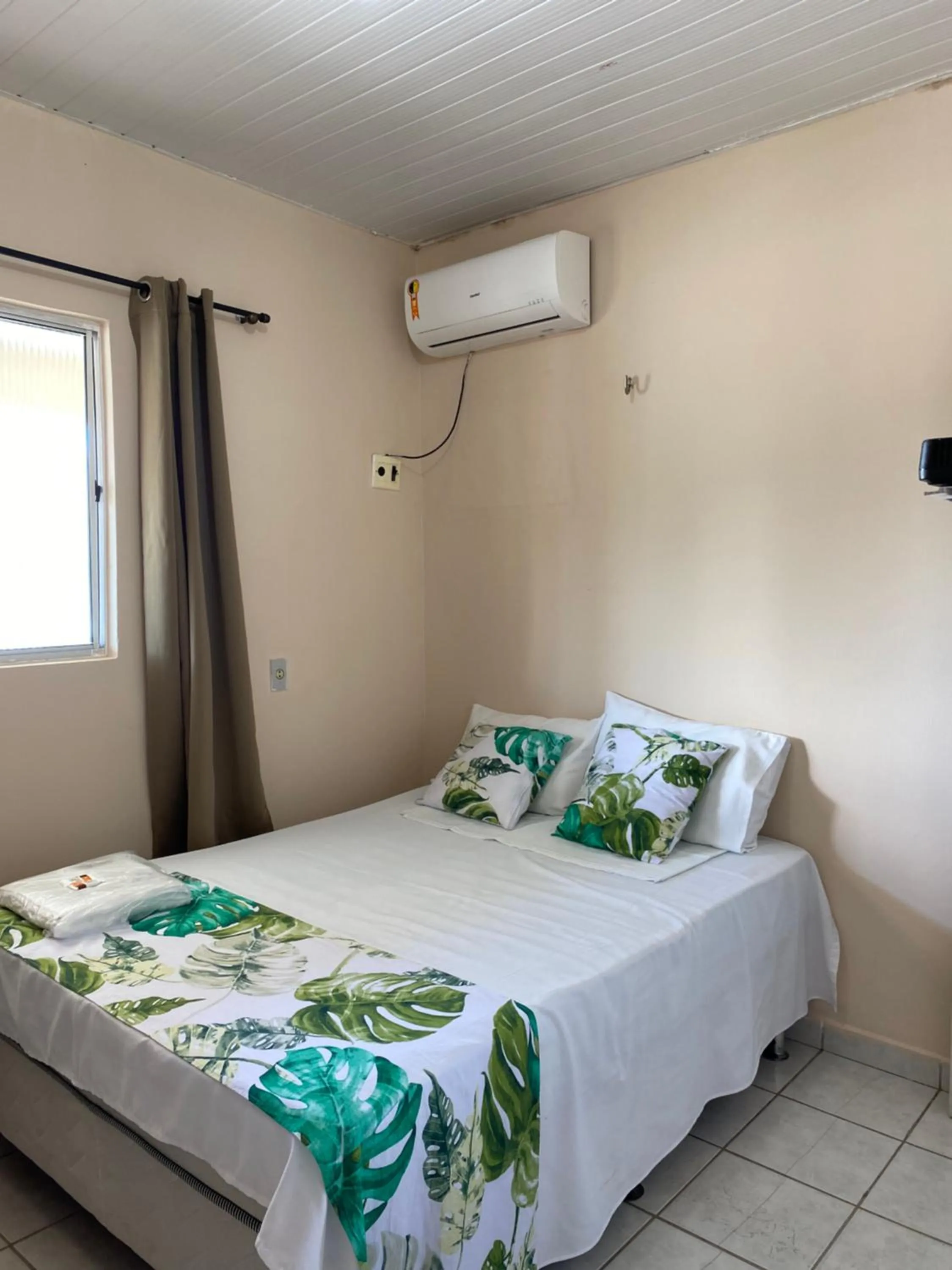 Bed in Pousada Rio Alegre