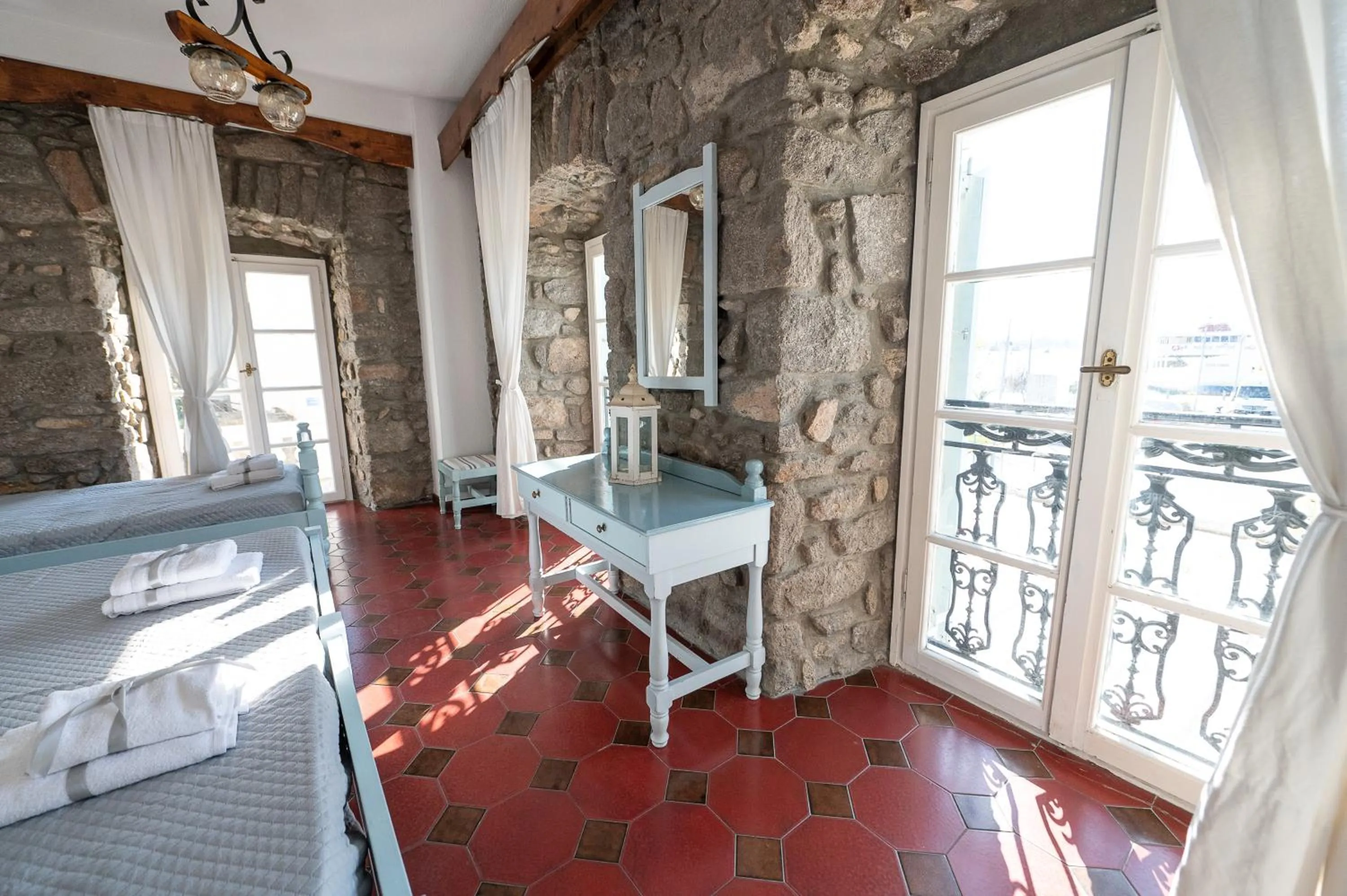 Seating area, Bed in Dionysos Hotel
