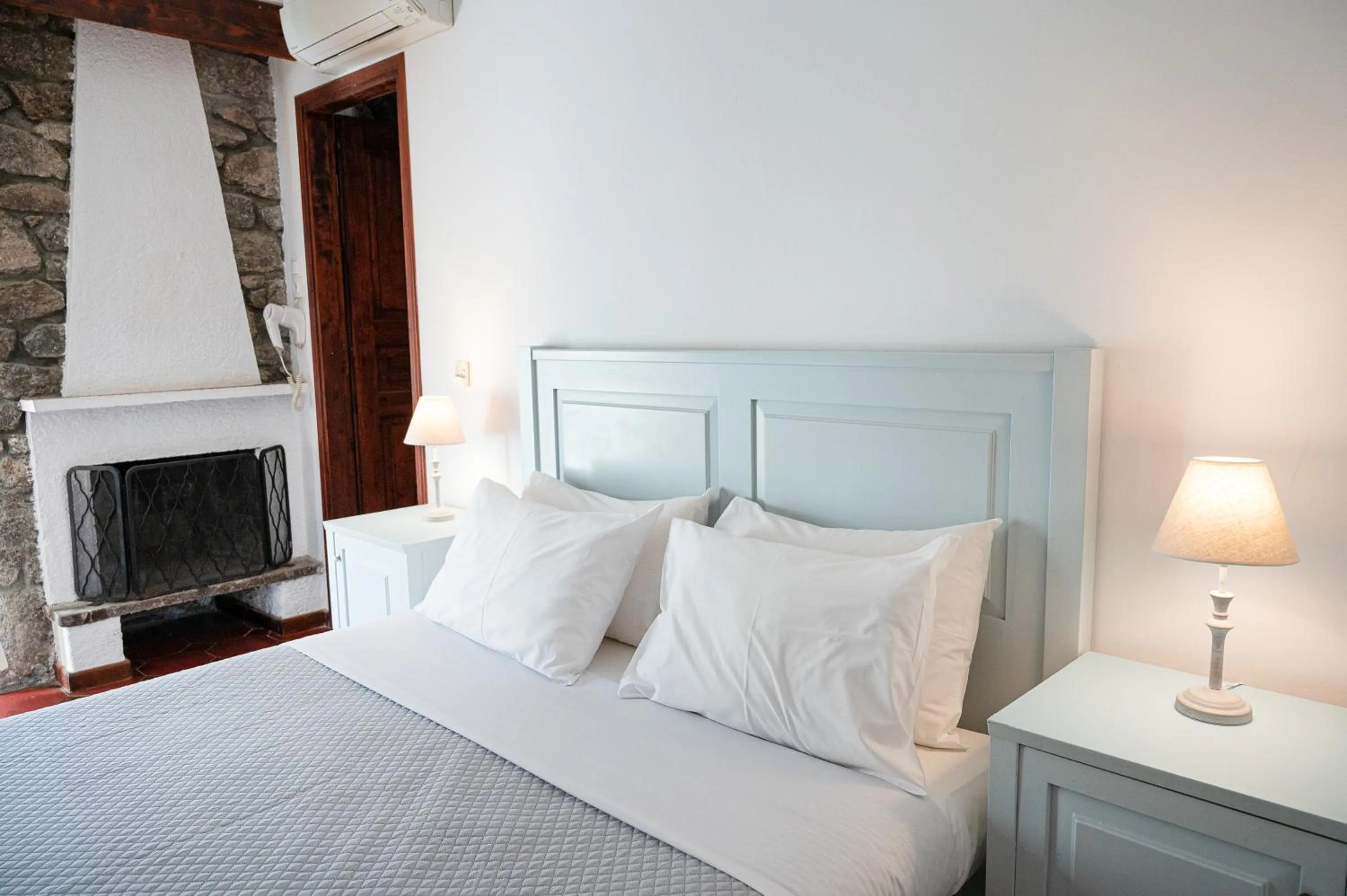 Bed in Dionysos Hotel