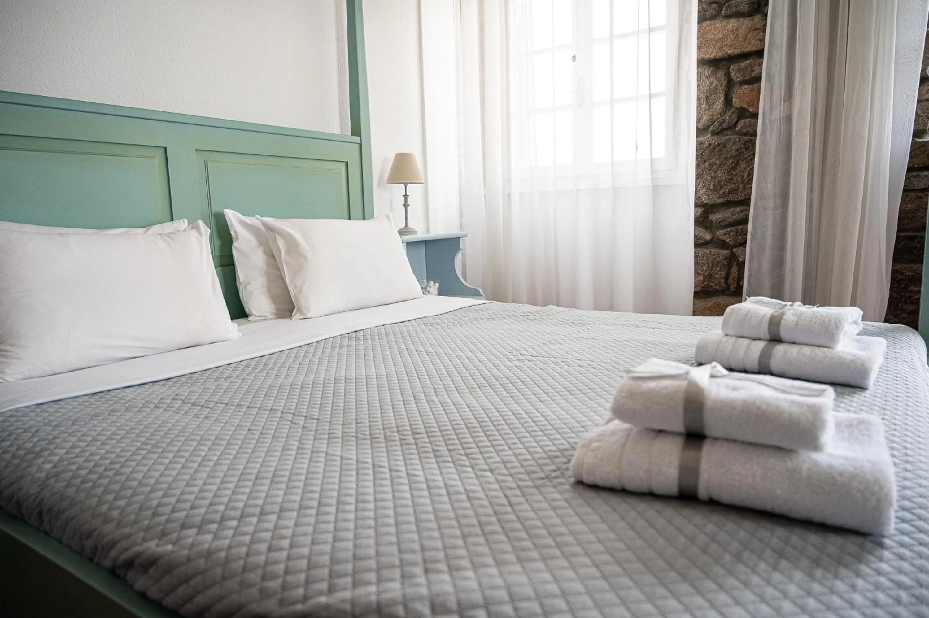 Bed in Dionysos Hotel