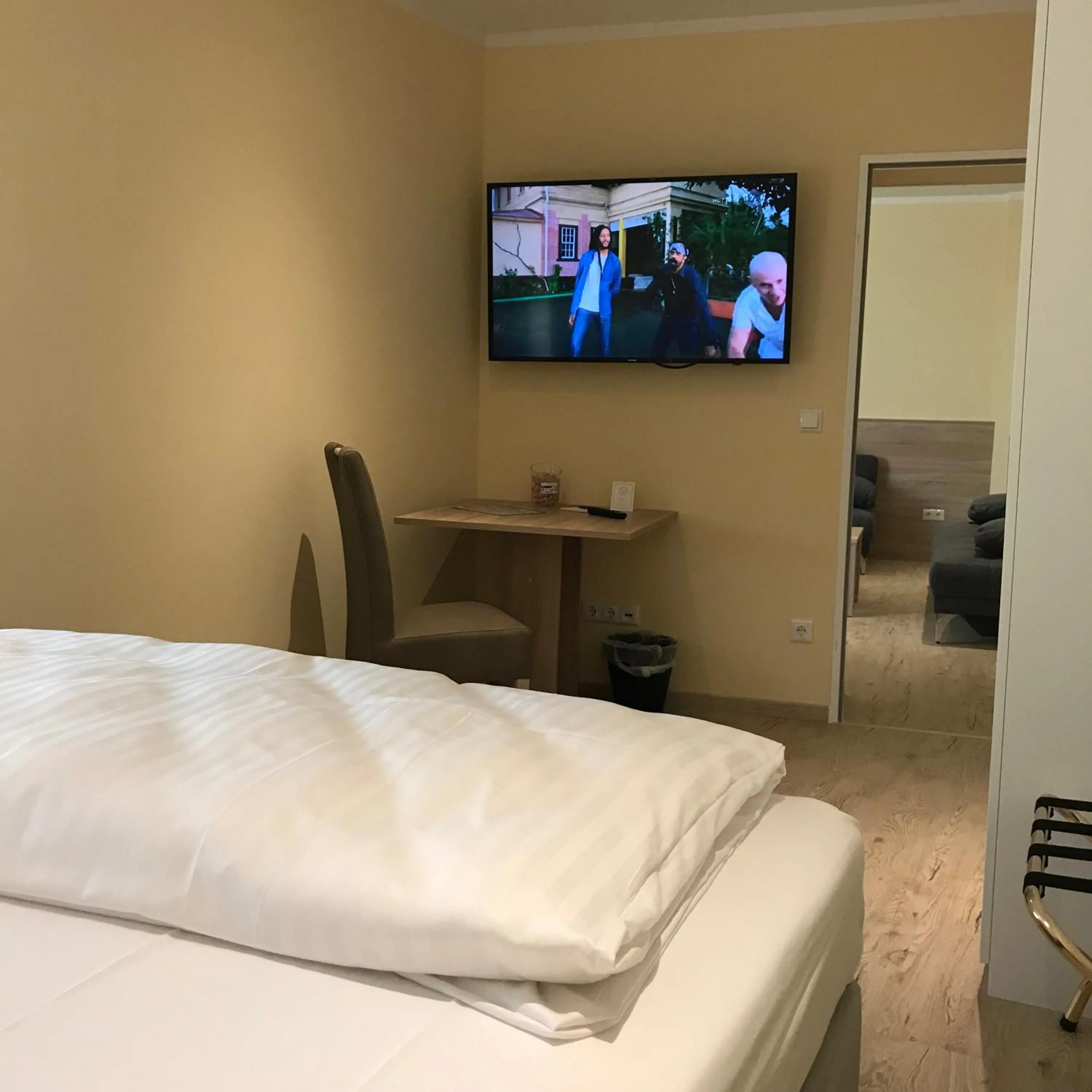 Bed in Hotel Select Suites & Aparts