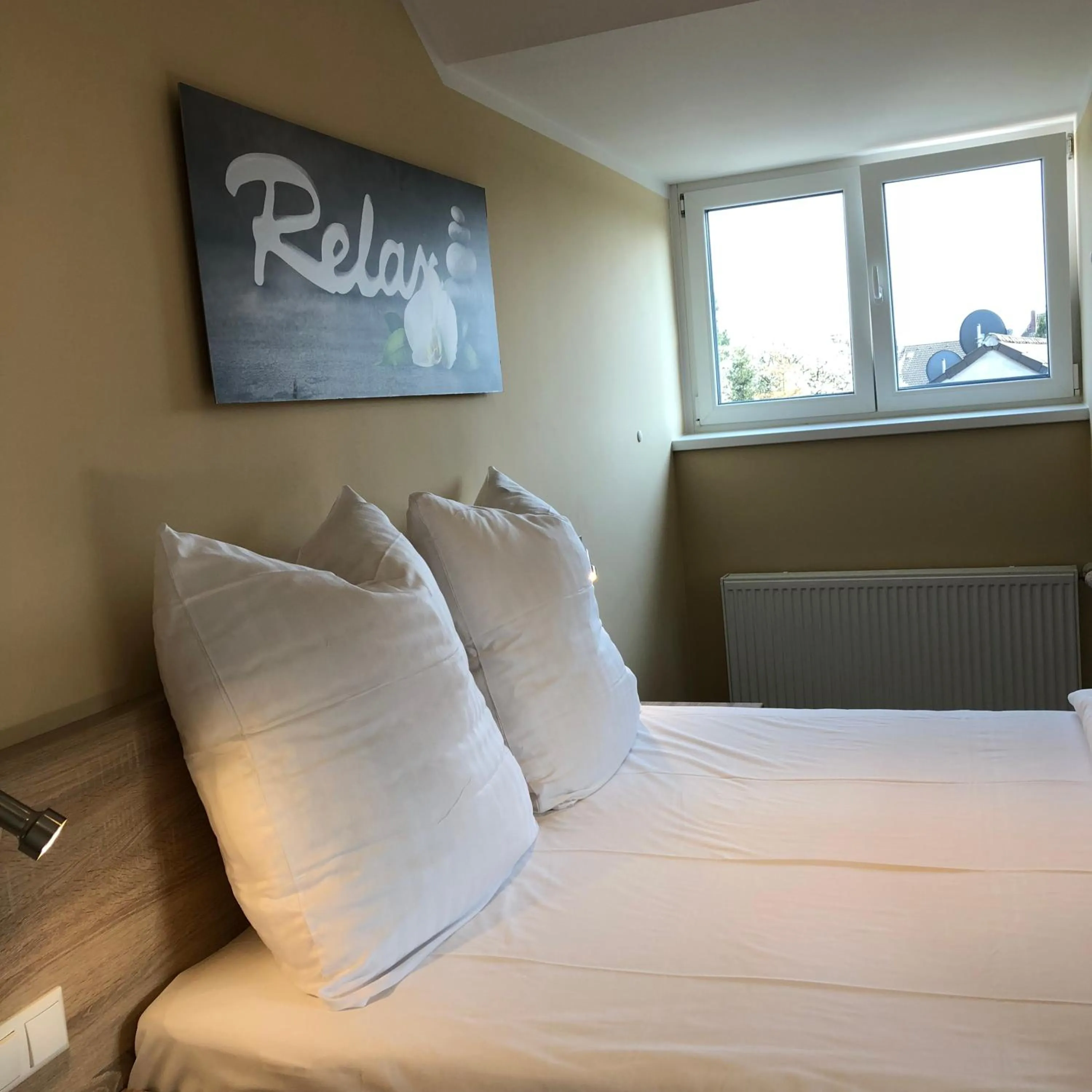 Bed in Hotel Select Suites & Aparts