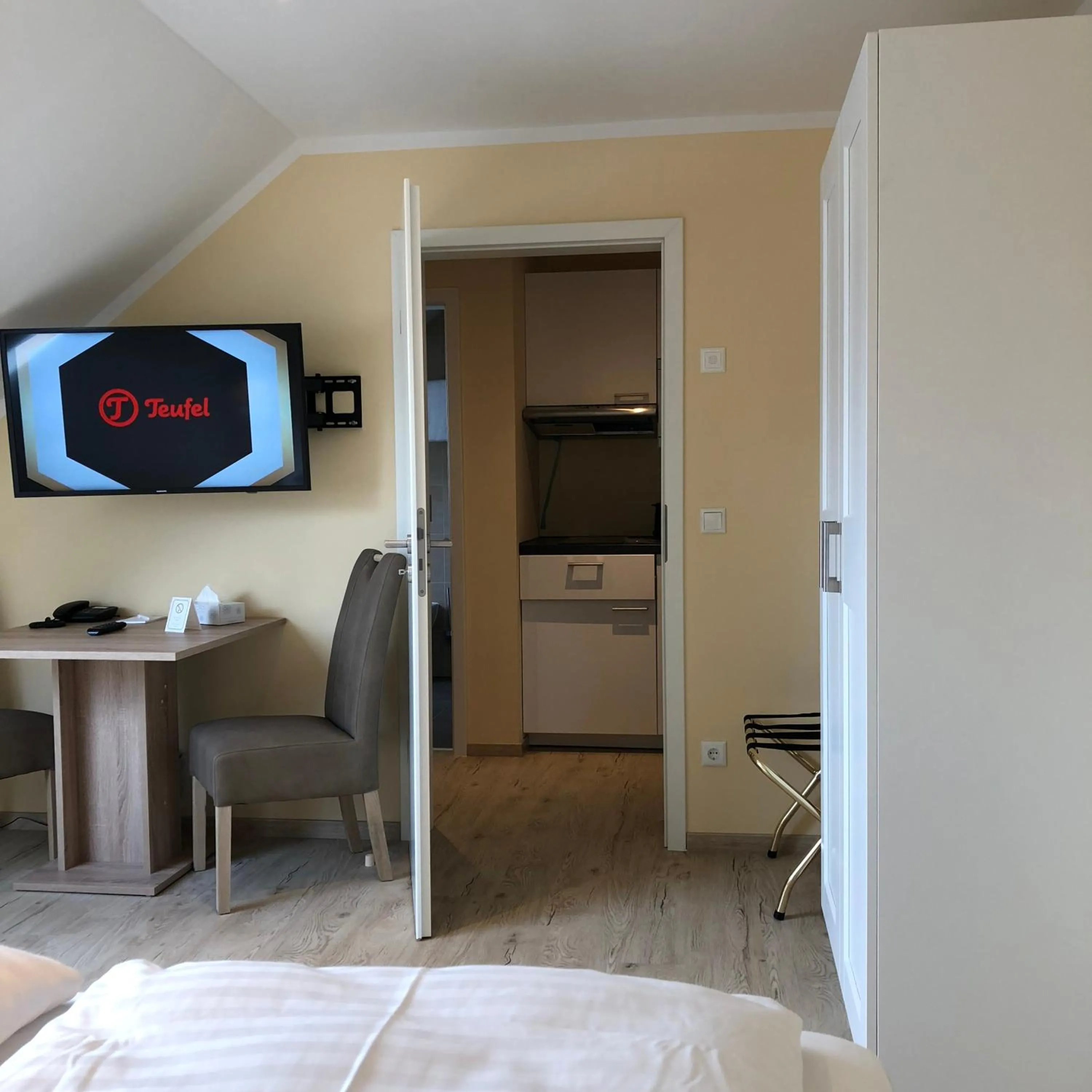 Bed in Hotel Select Suites & Aparts