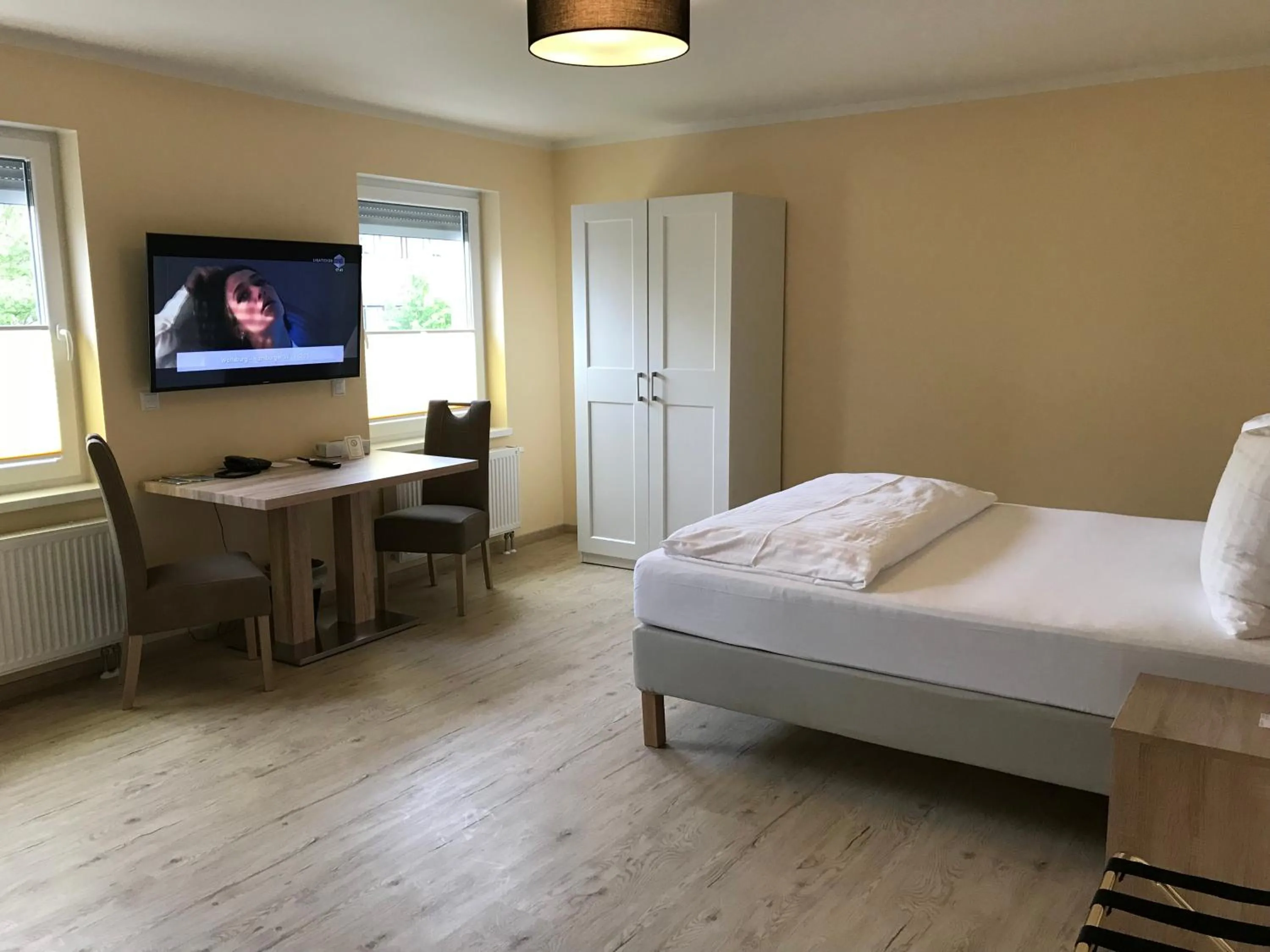 Bed in Hotel Select Suites & Aparts