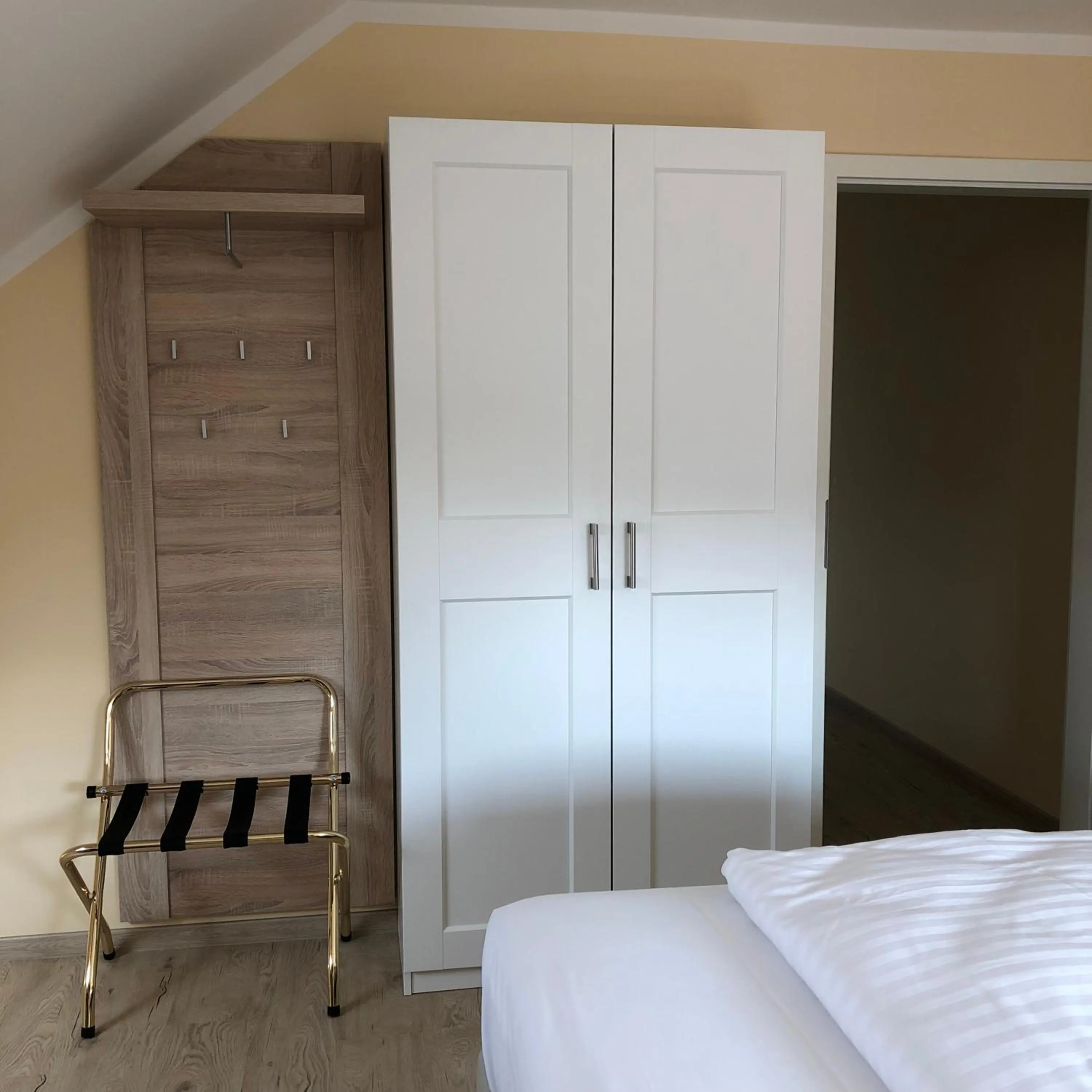 Bed in Hotel Select Suites & Aparts