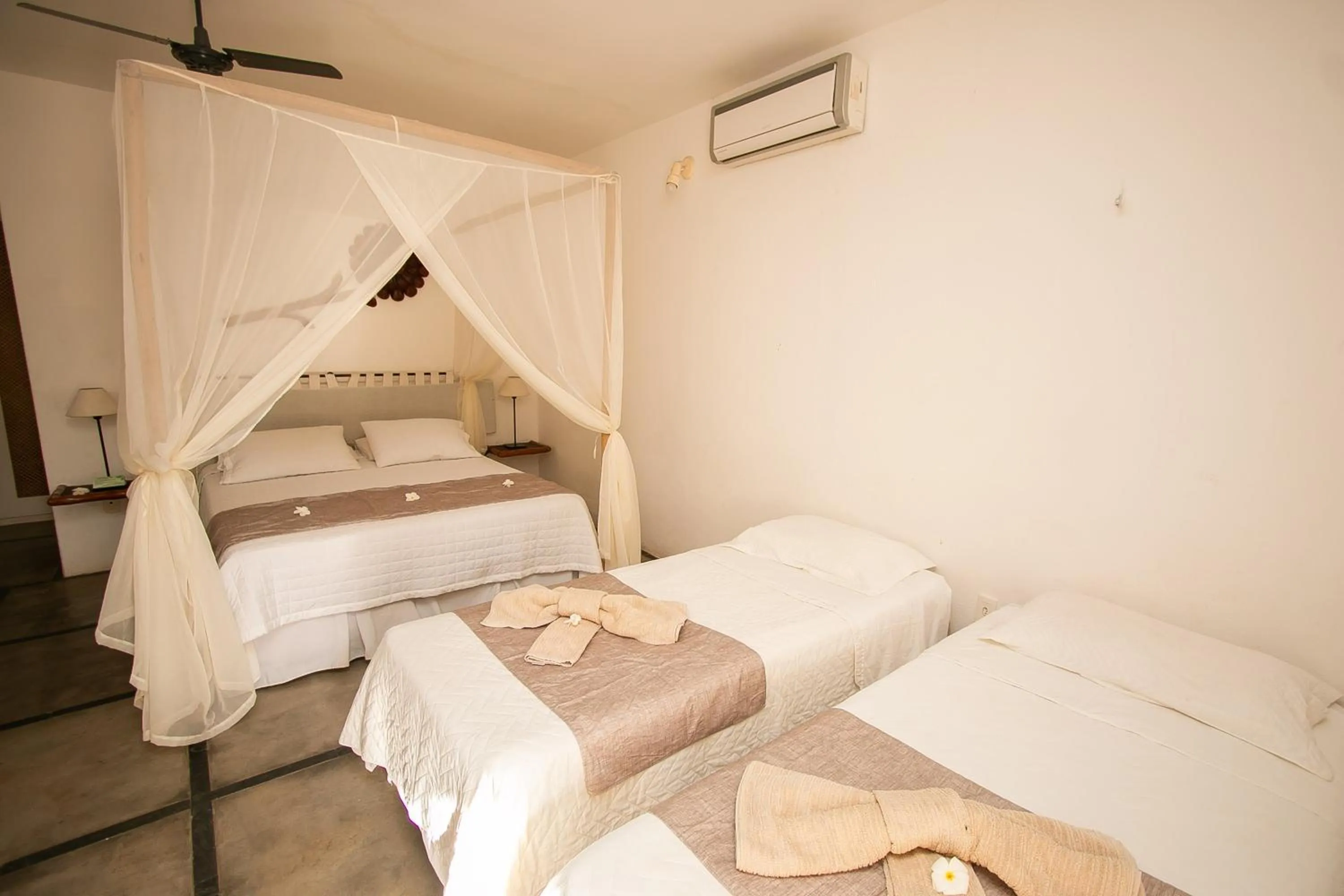Bed in Amagali Pousada