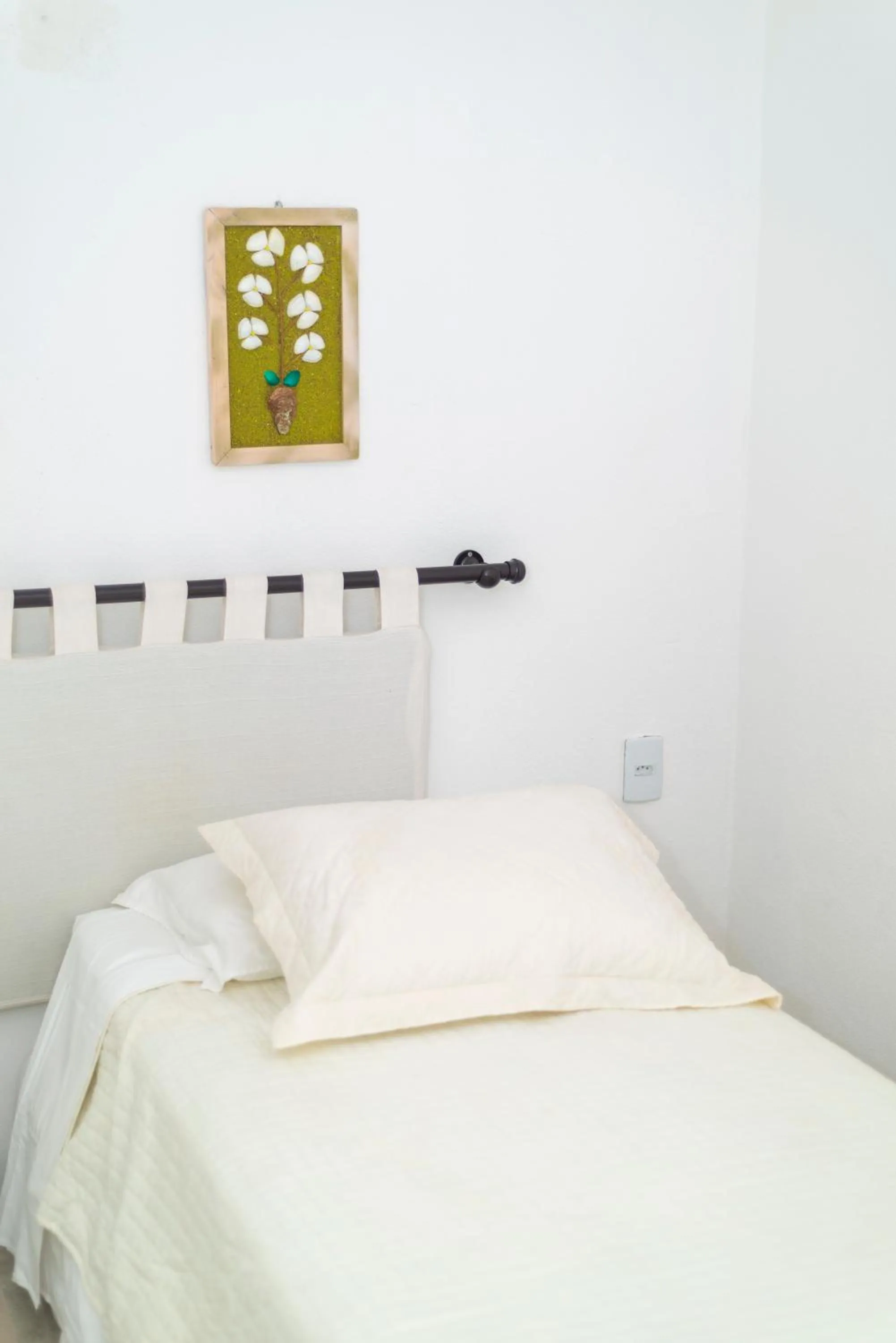 Bed in Amagali Pousada