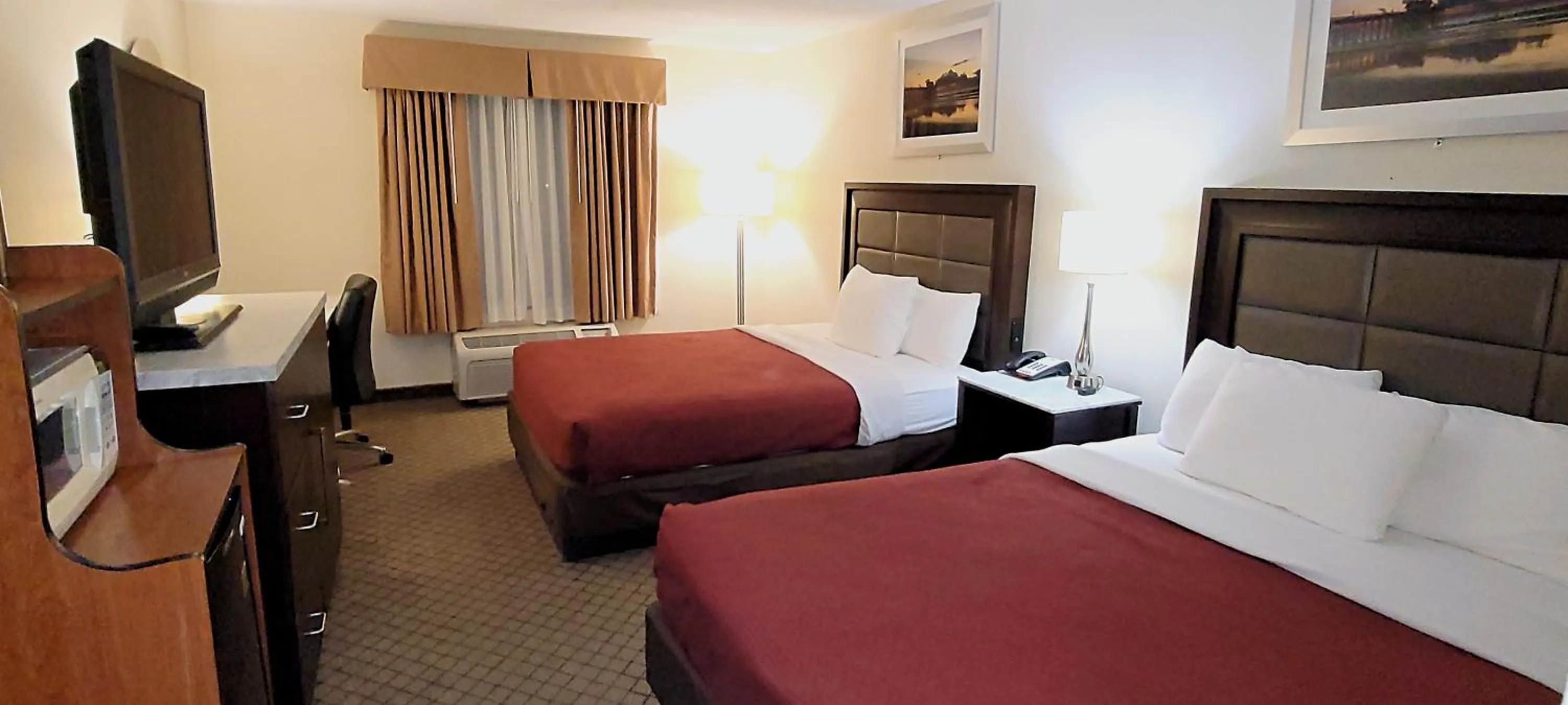 Bed in Home Inn & Suites