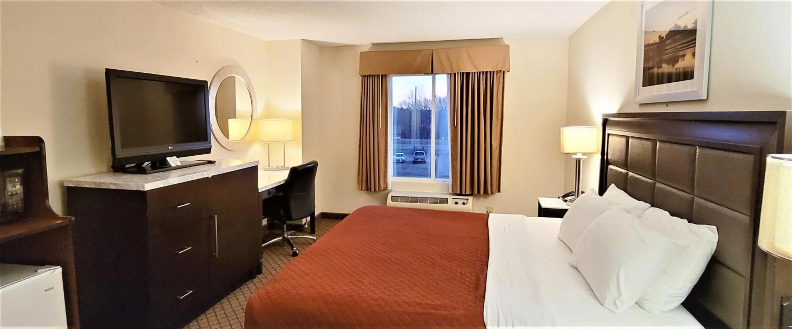 Bed in Home Inn & Suites